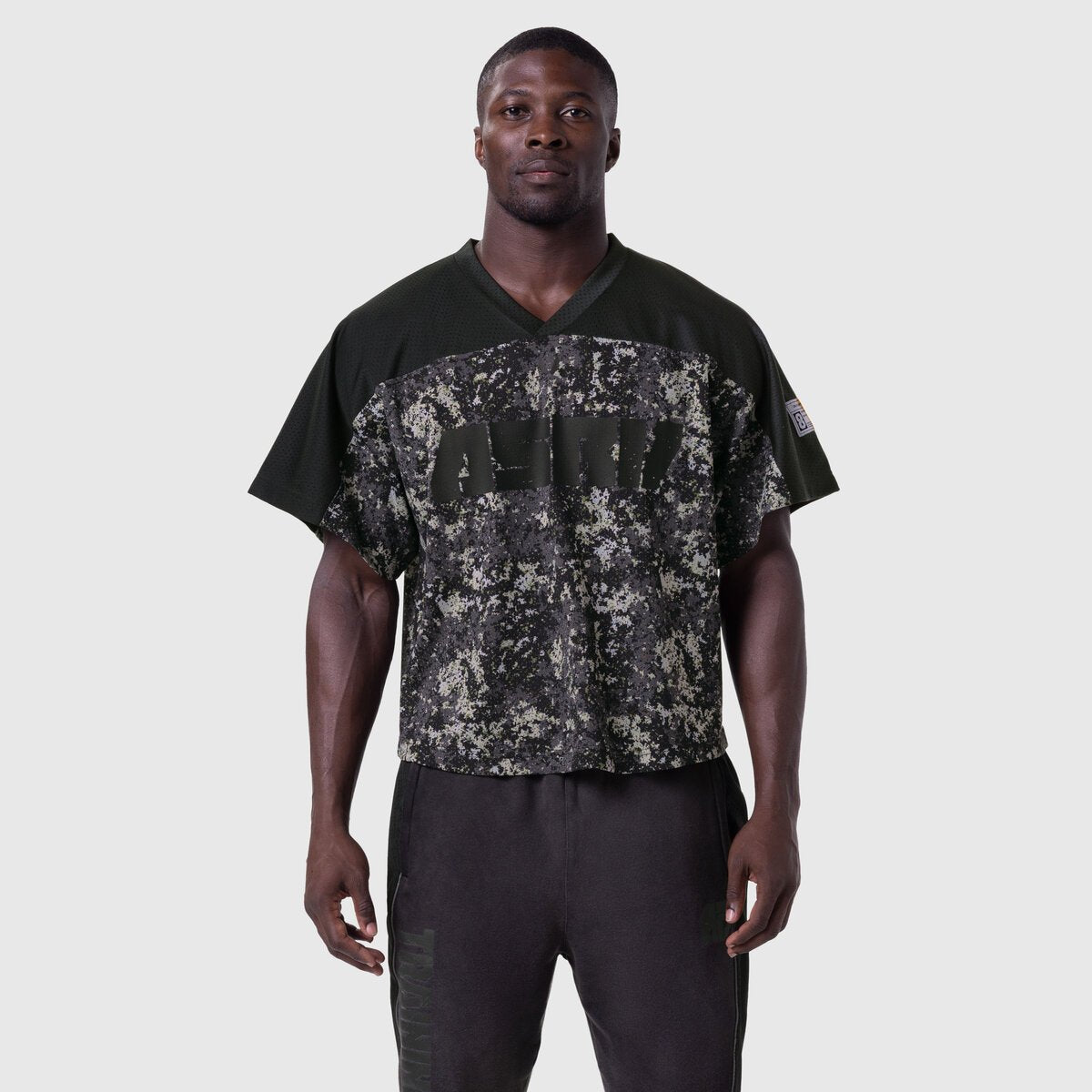 Ion-Mesh™ Crop Jersey in black pixel camo, worn by model, front view