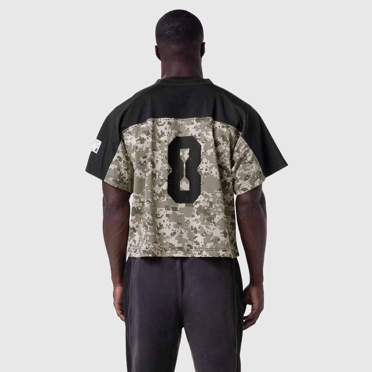 Ion-Mesh™ Crop Jersey in digital camo with black sleeves, back view on model