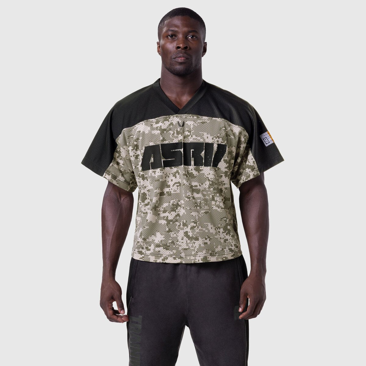 Ion-Mesh Crop Jersey in digital camo and black, worn by male model facing forward