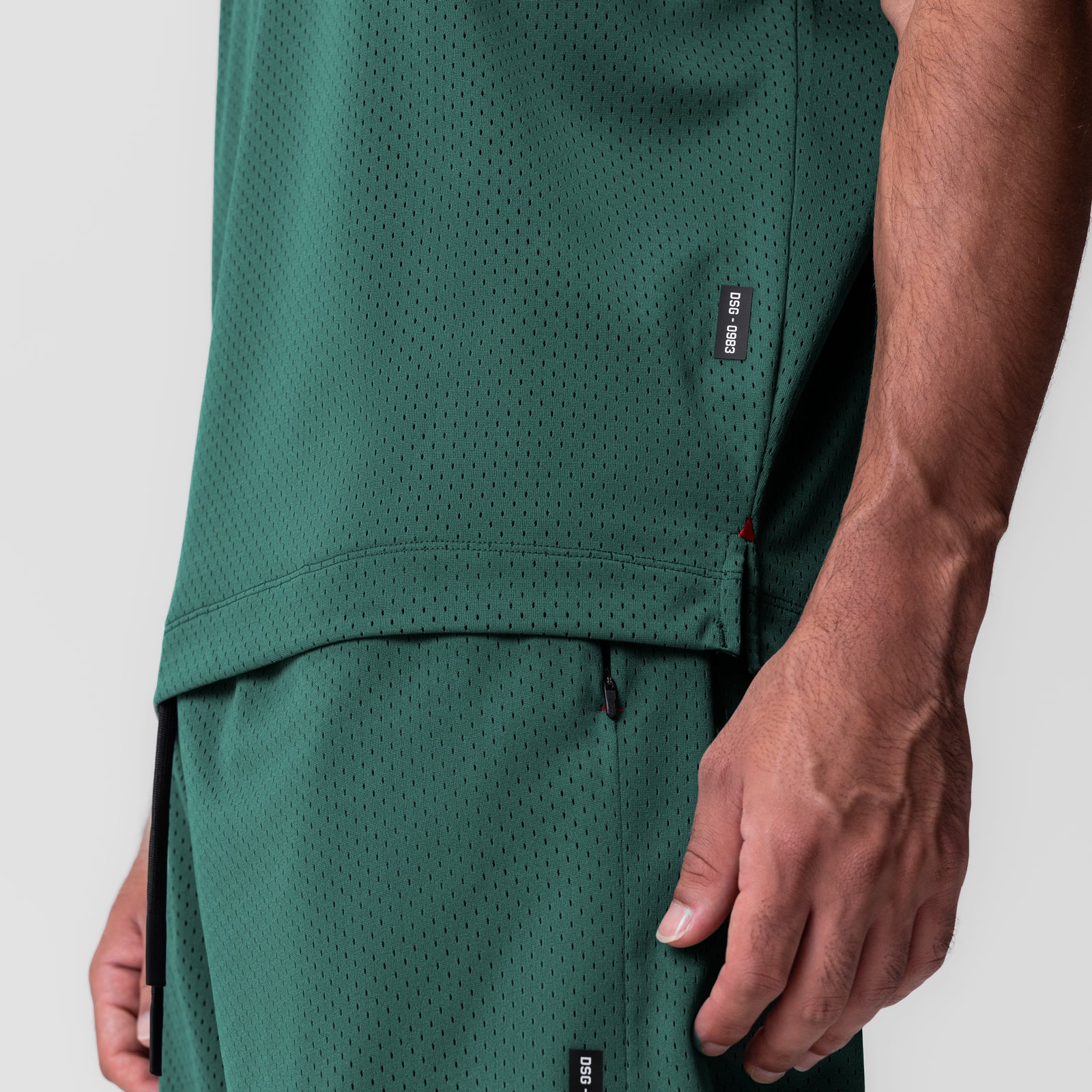 Reversible 2-in-1 Cutoff Hoodie in forest green, worn by model, side detail view