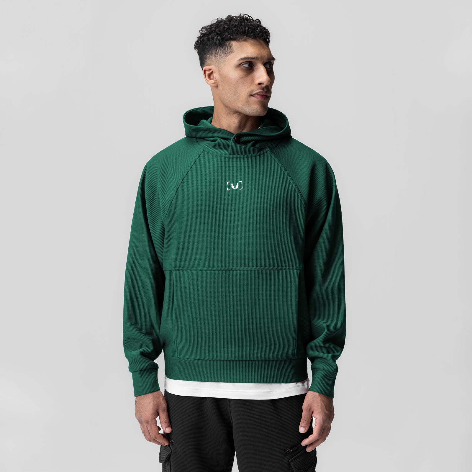 Deltapeak® Oversized Hoodie in forest green worn by model, front view