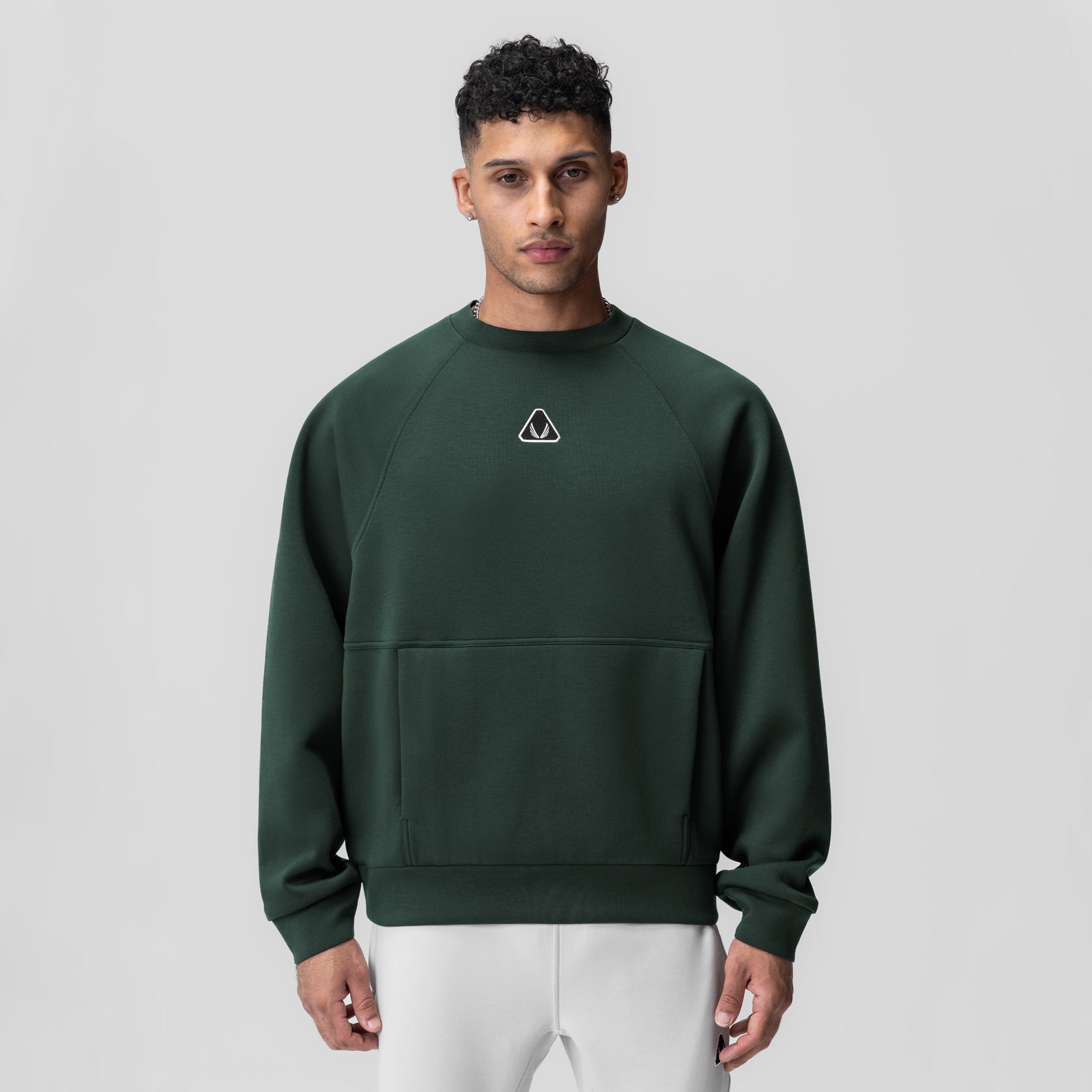 Dri-Core™ Oversized Crewneck in forest green, frontal view on model