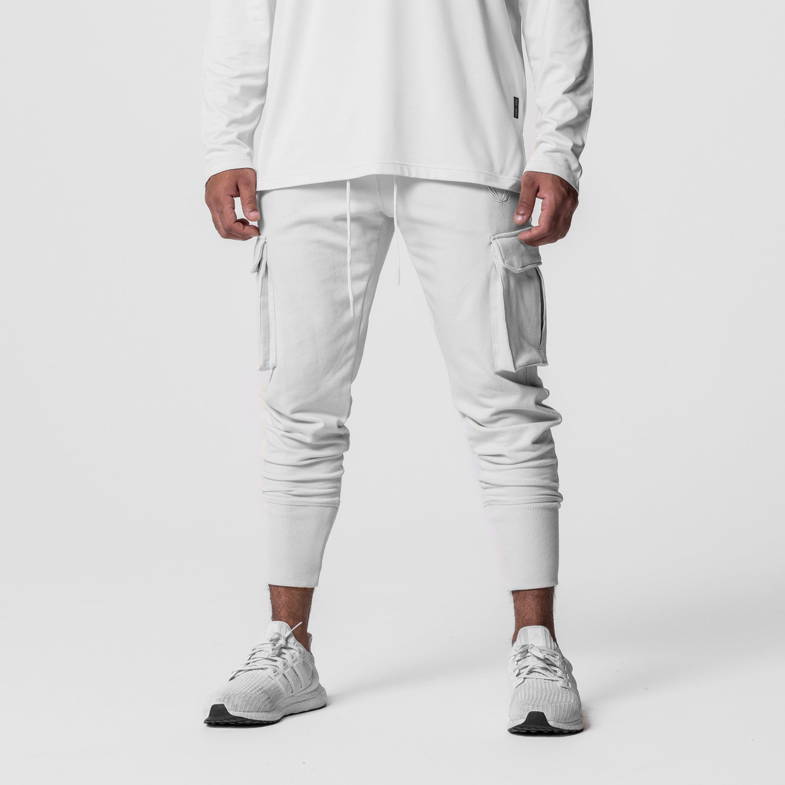 Tech-Terry Cargo High Rib Jogger in white, modeled from waist down with hands at pockets
