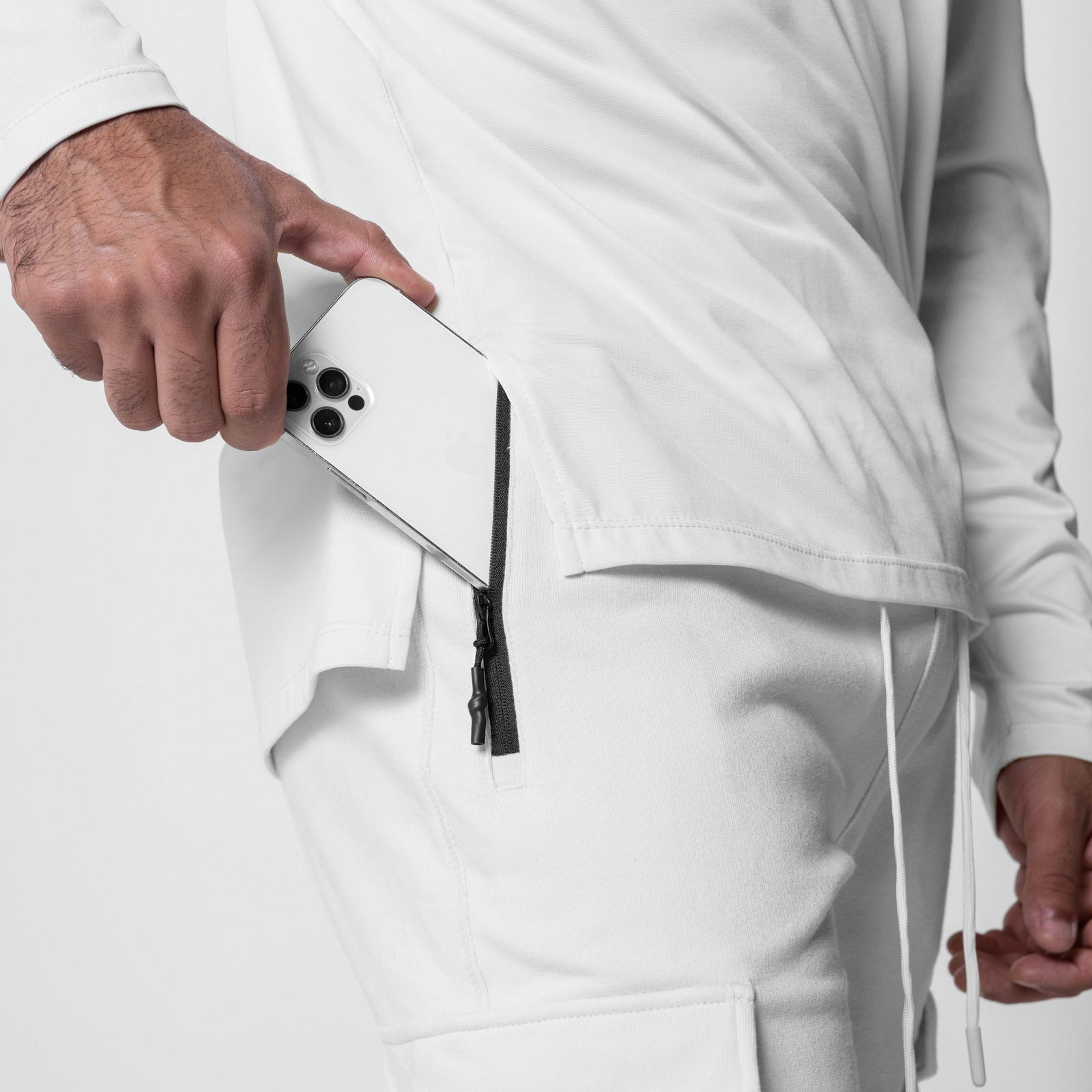 Tech-Terry Cargo High Rib Jogger in white, worn by model showing pocket detail