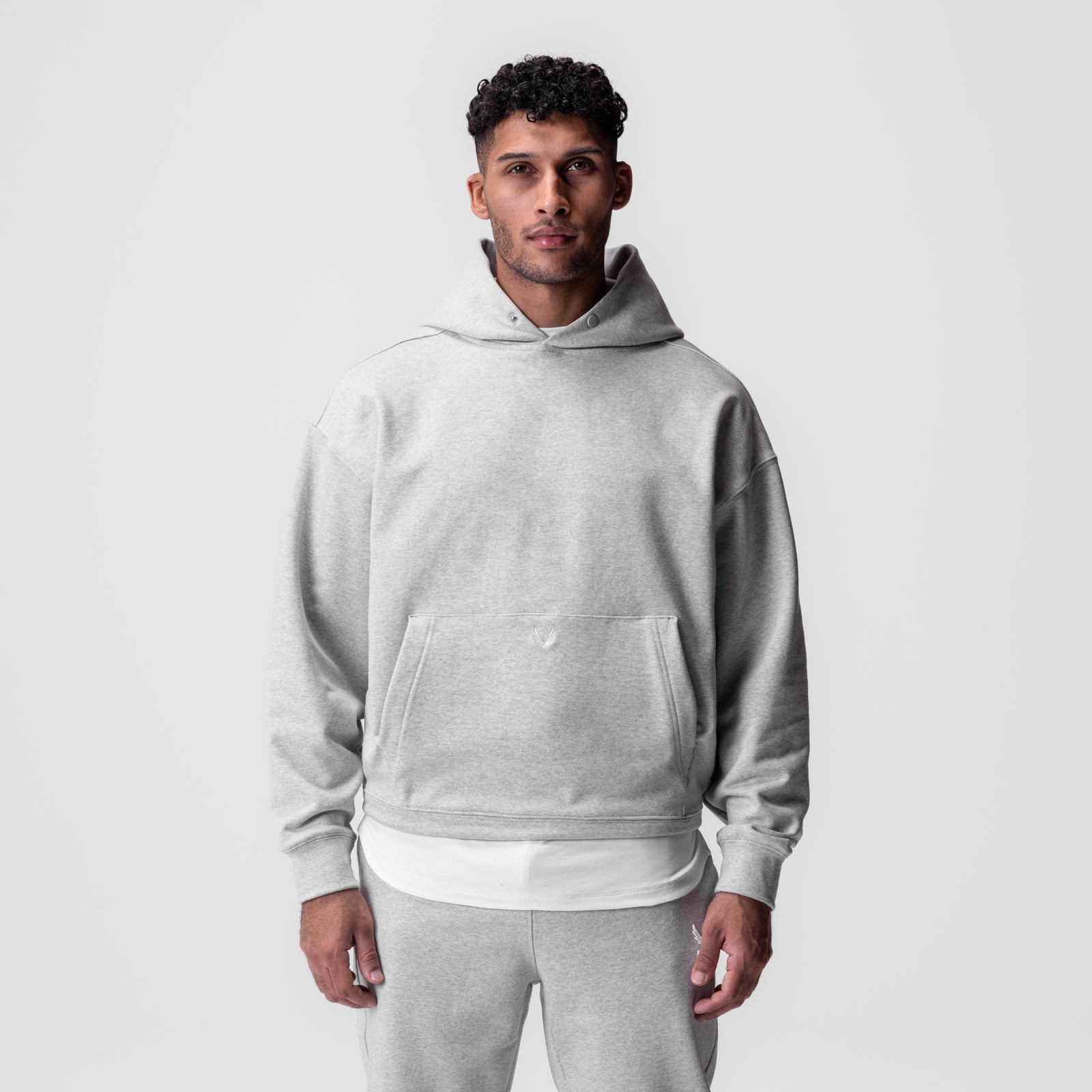 Tech-Terry™ Hoodie in Heather Grey worn by model, front view