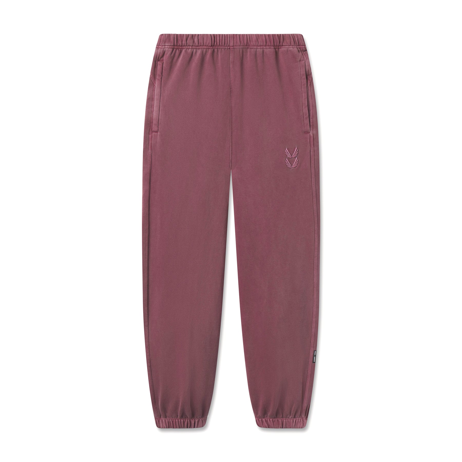 flatlay Tech Essential Sweats joggers in faded crimson, front view