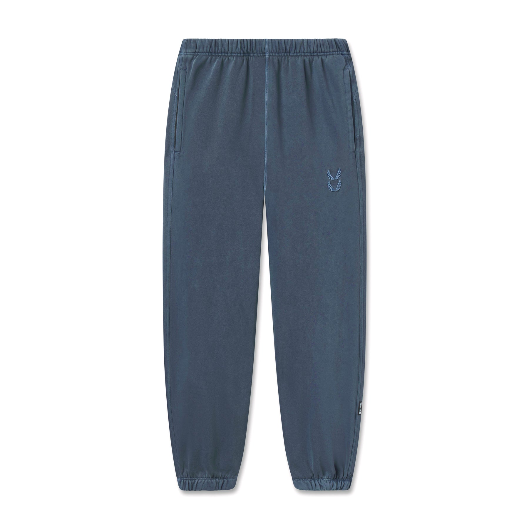 flatlay Tech Essential Sweats joggers in faded navy, front view