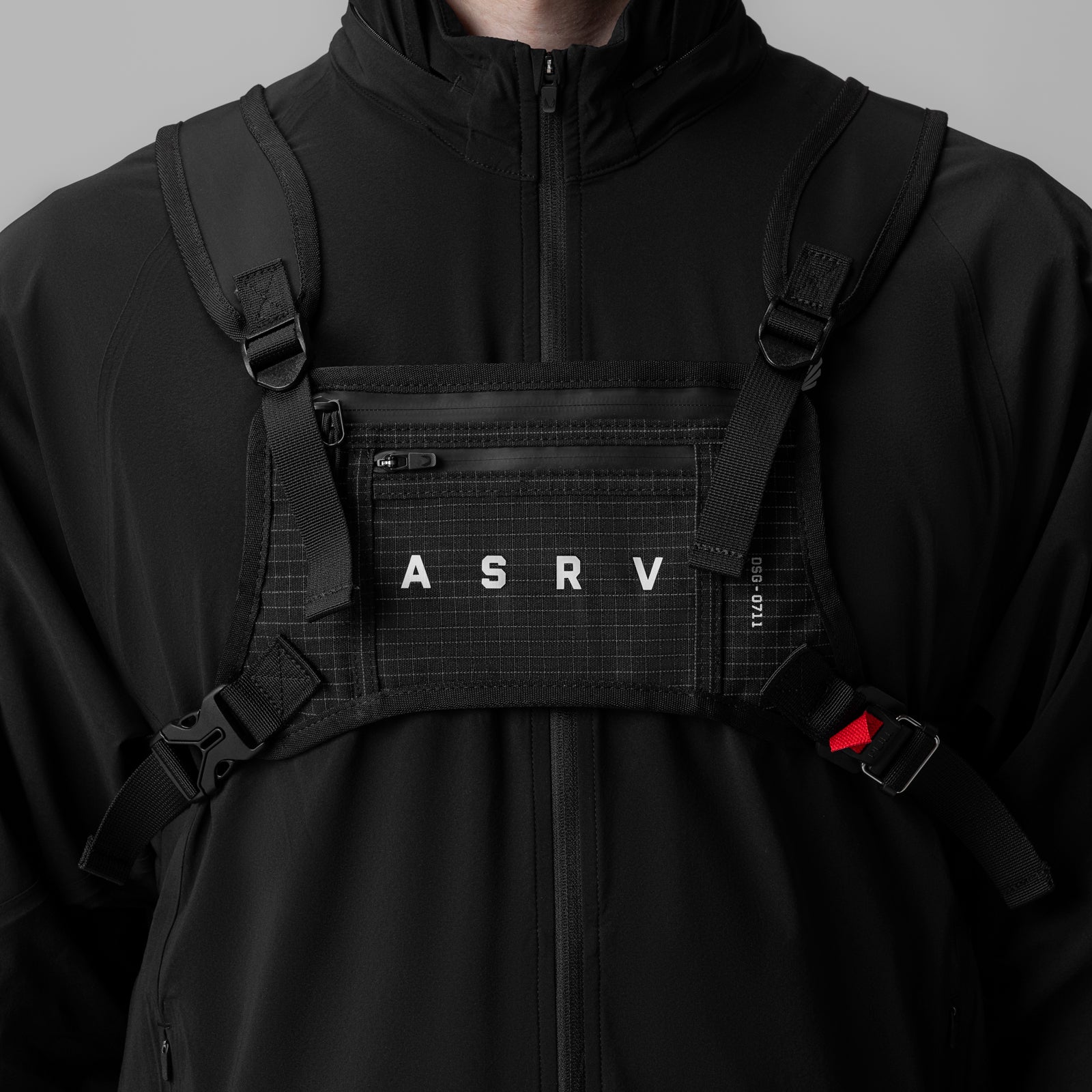 0711 Cordura Lightweight Chest Pack in black grid, worn on model, front view