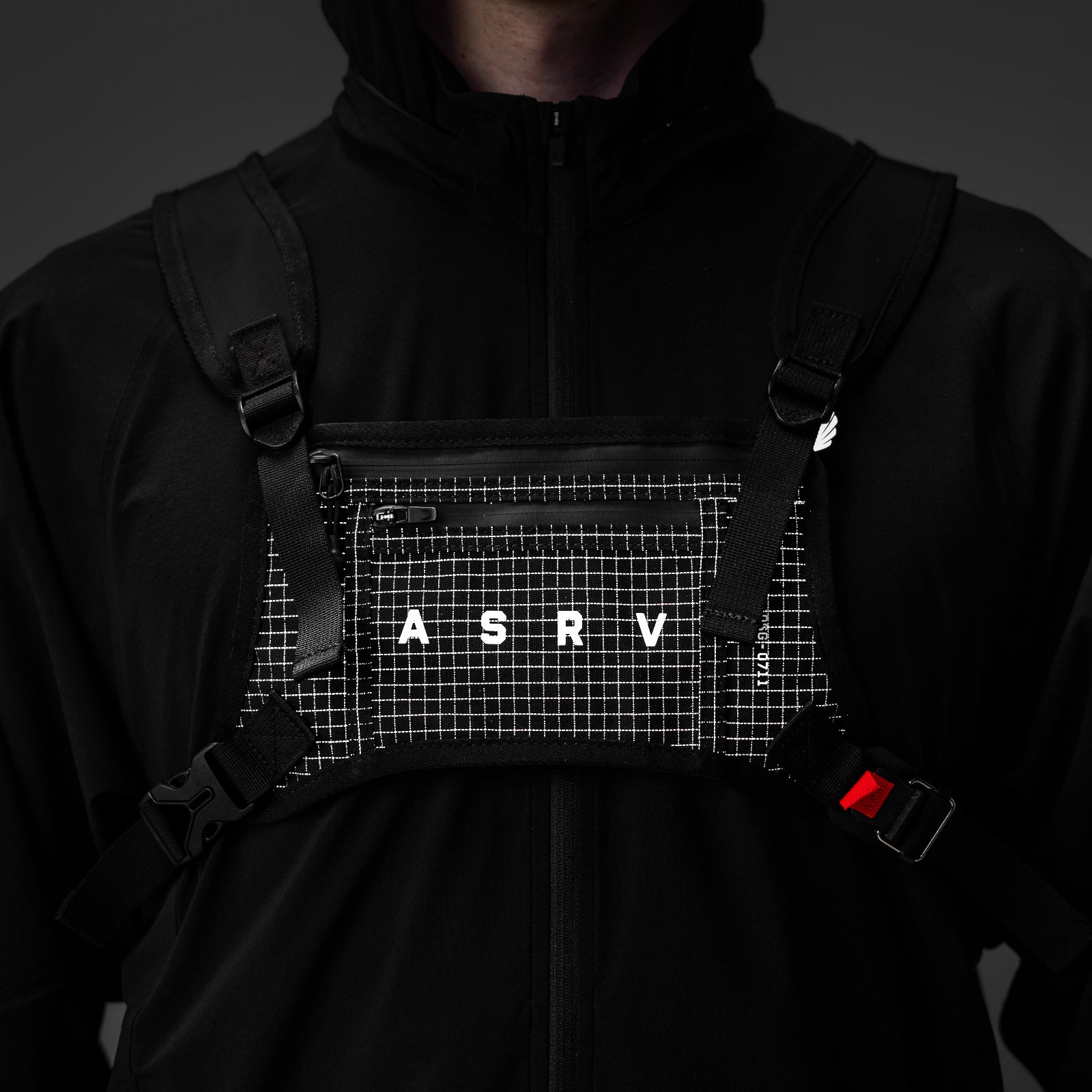 0711 Cordura Lightweight Chest Pack in Black Grid, worn on model, front view