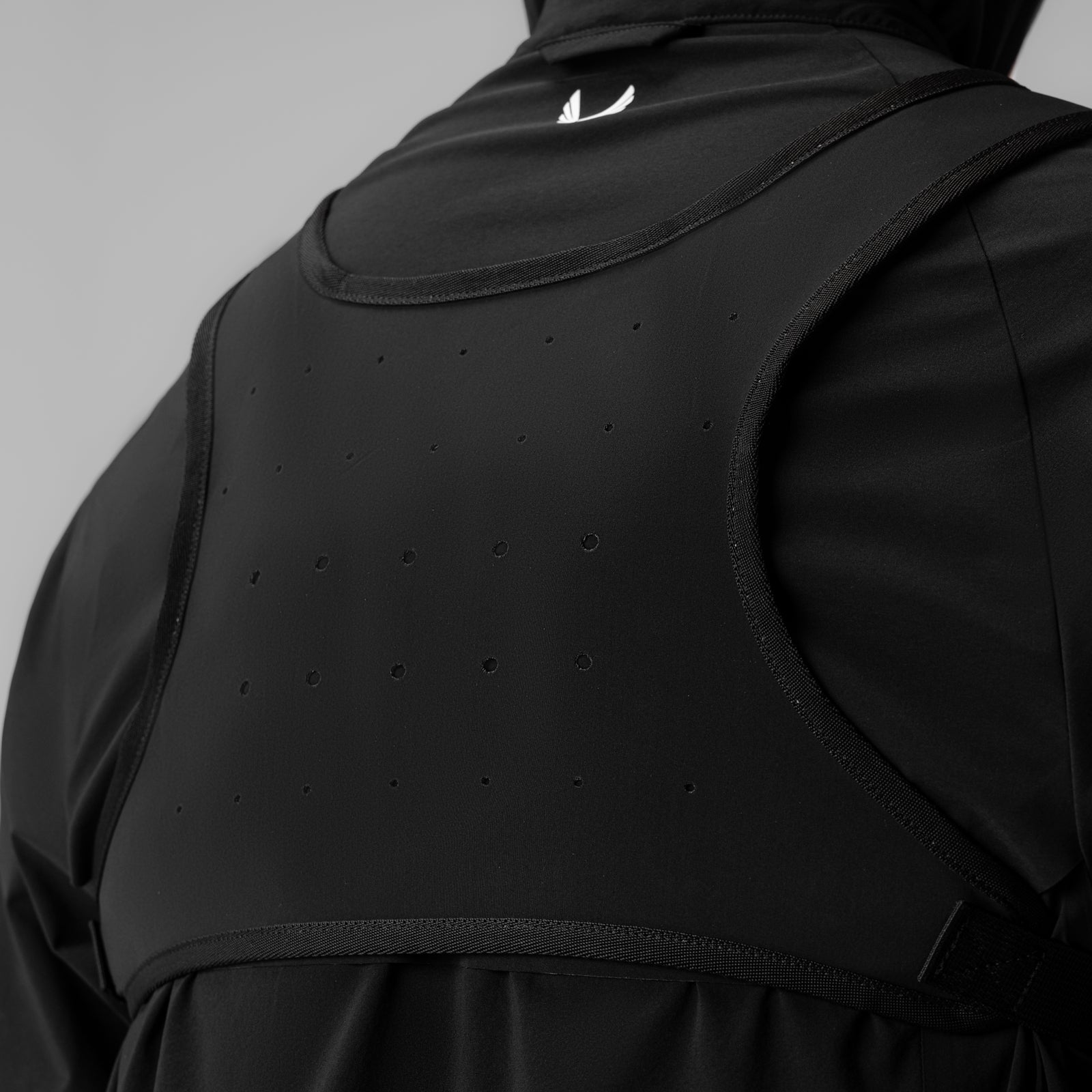 0711 Cordura Lightweight Chest Pack in Black Grid, back view on model
