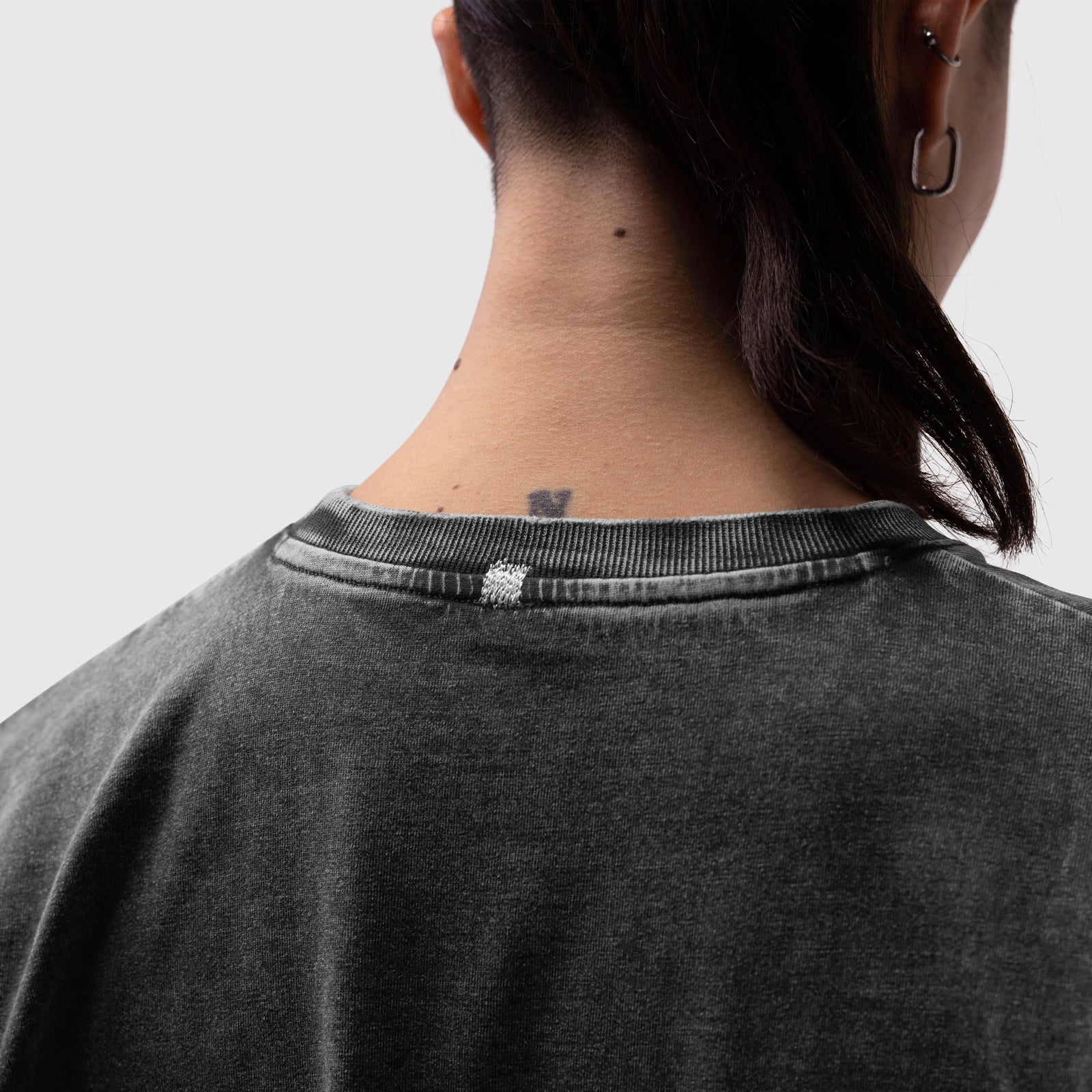 Distressed Relaxed Tee in black, back view on model
