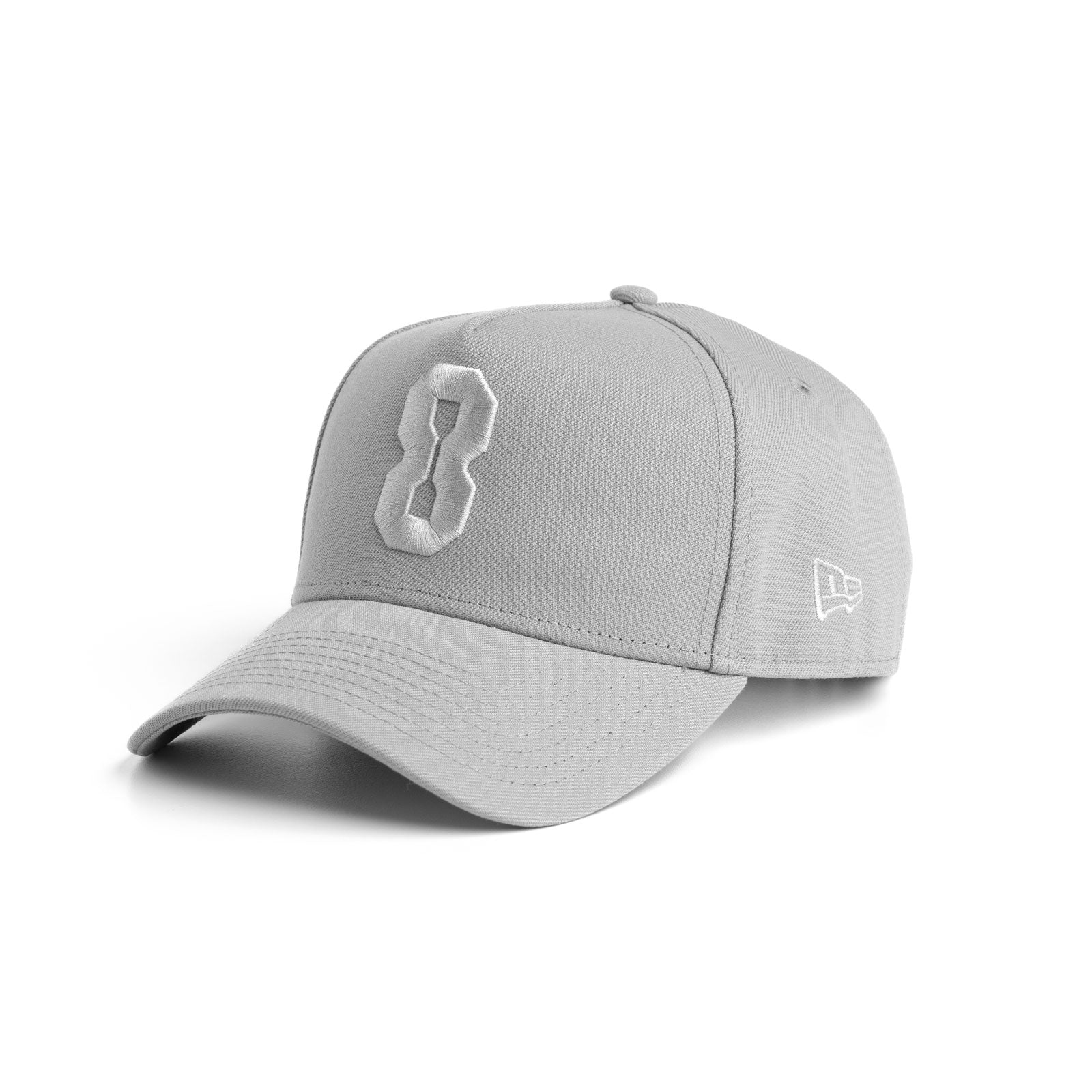 flatlay New Era 9Forty A-Frame Hat in grey with embroidered 8 logo, side view