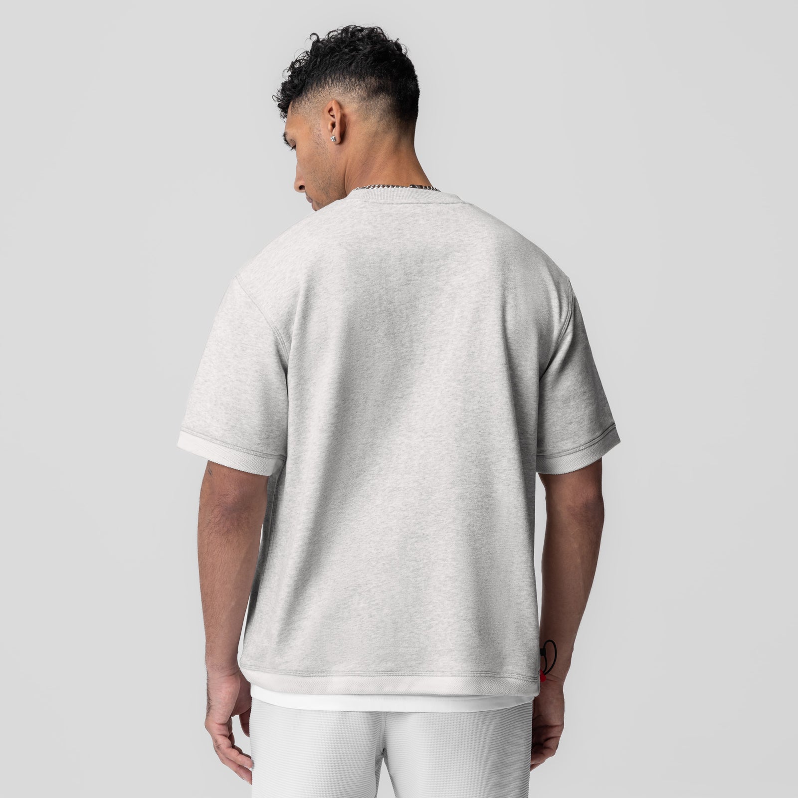Herringbone Terry Oversized Cinch Tee in heather grey, back view on model