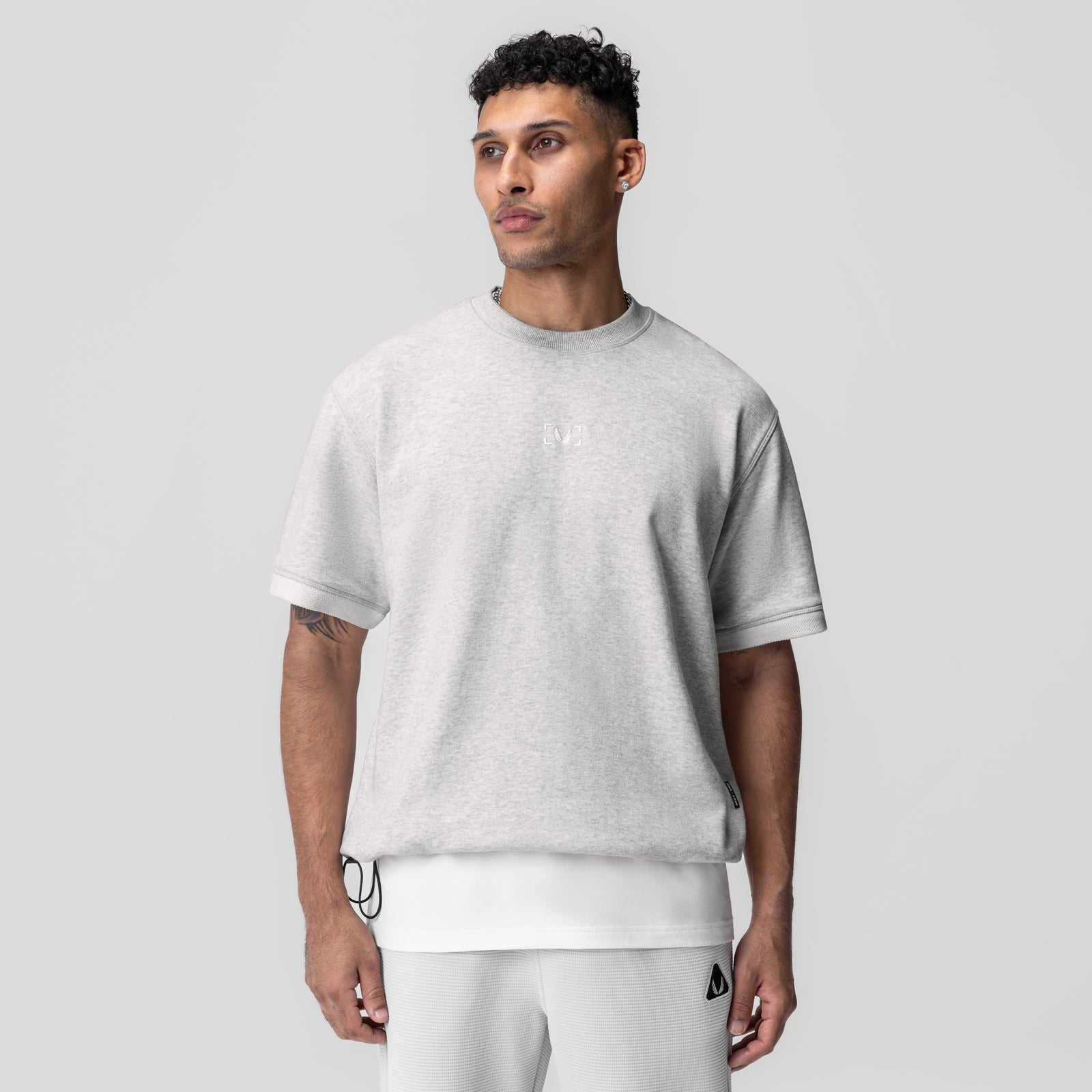 Herringbone Terry Oversized Cinch Tee in heather grey, worn by model, front view