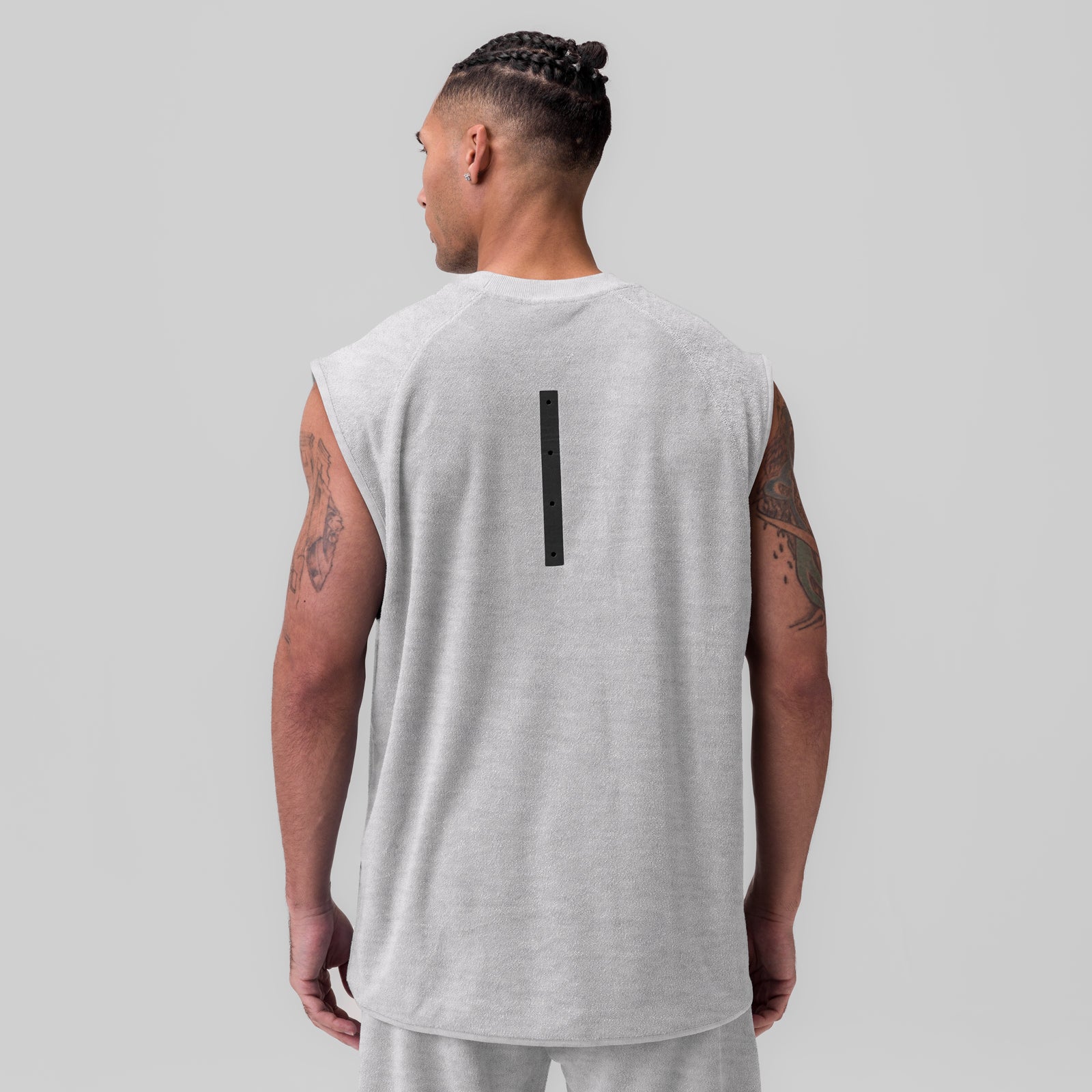 Heather grey towel terry cutoff tank top on male model, back view