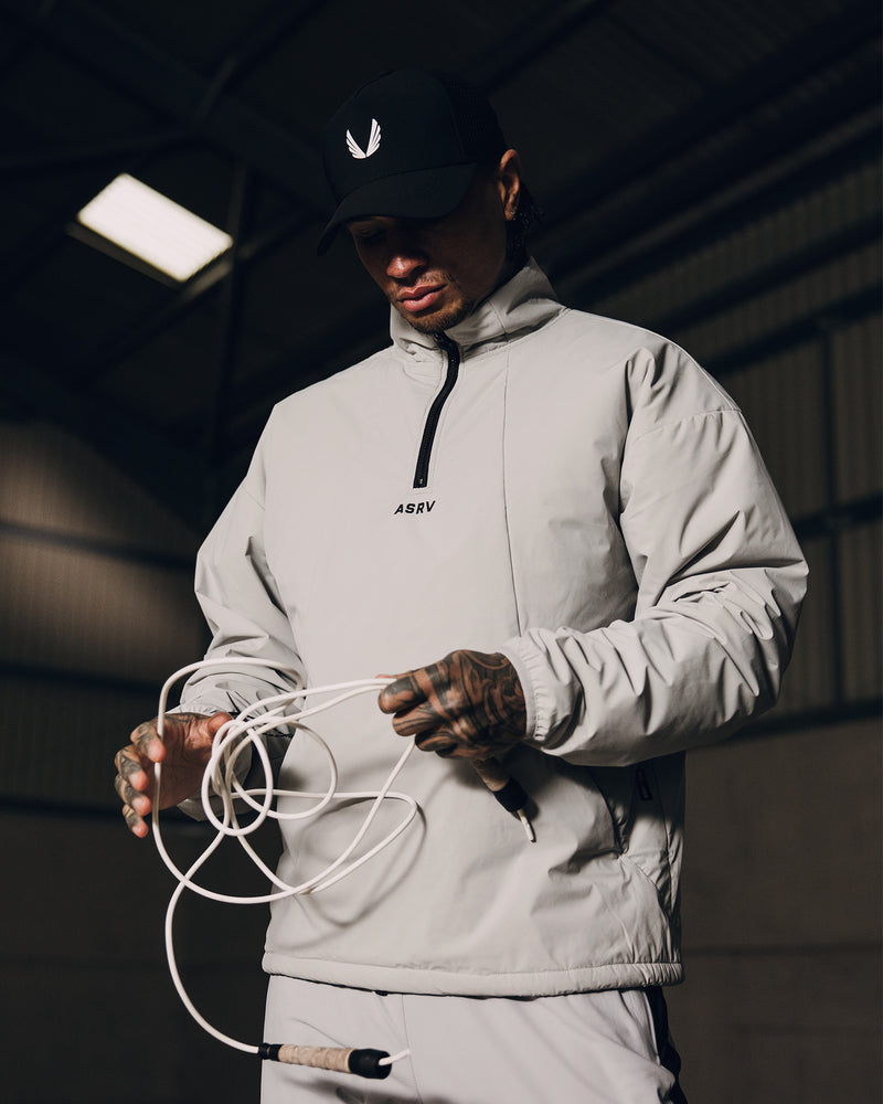 1056. Aerotex™ PrimaLoft® Quarter Zip - Black