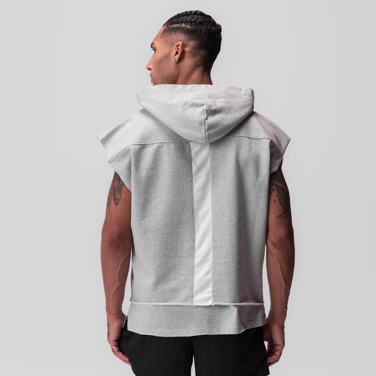 Tech Essential Raw Hem Cutoff Hoodie in heather grey, worn by model, back view