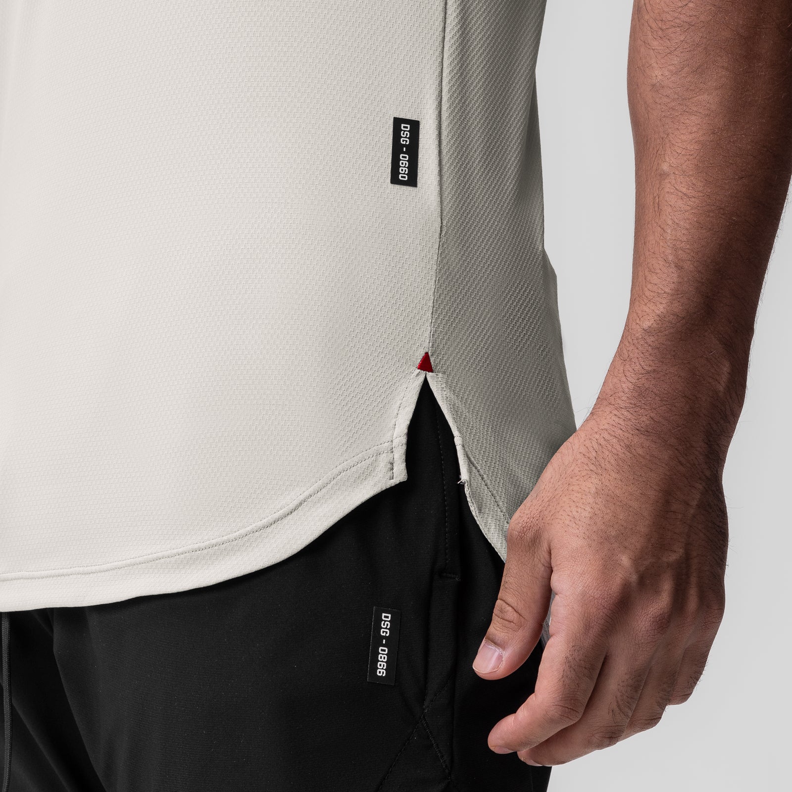 AeroSilver Established Tee in ivory cream worn by model, side detail view