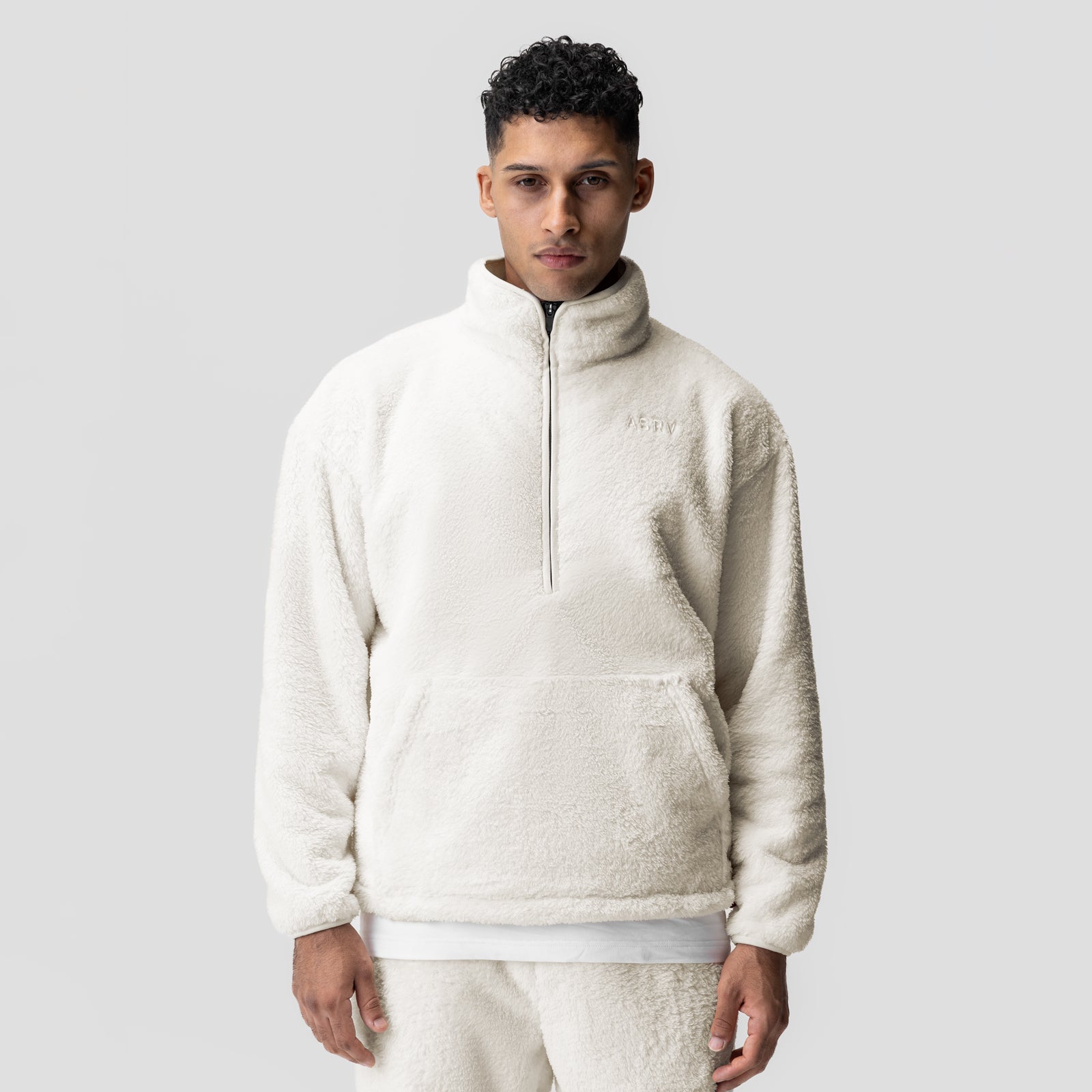 Sherpa Recovery 1/2 Zip in ivory cream, worn by model, front view