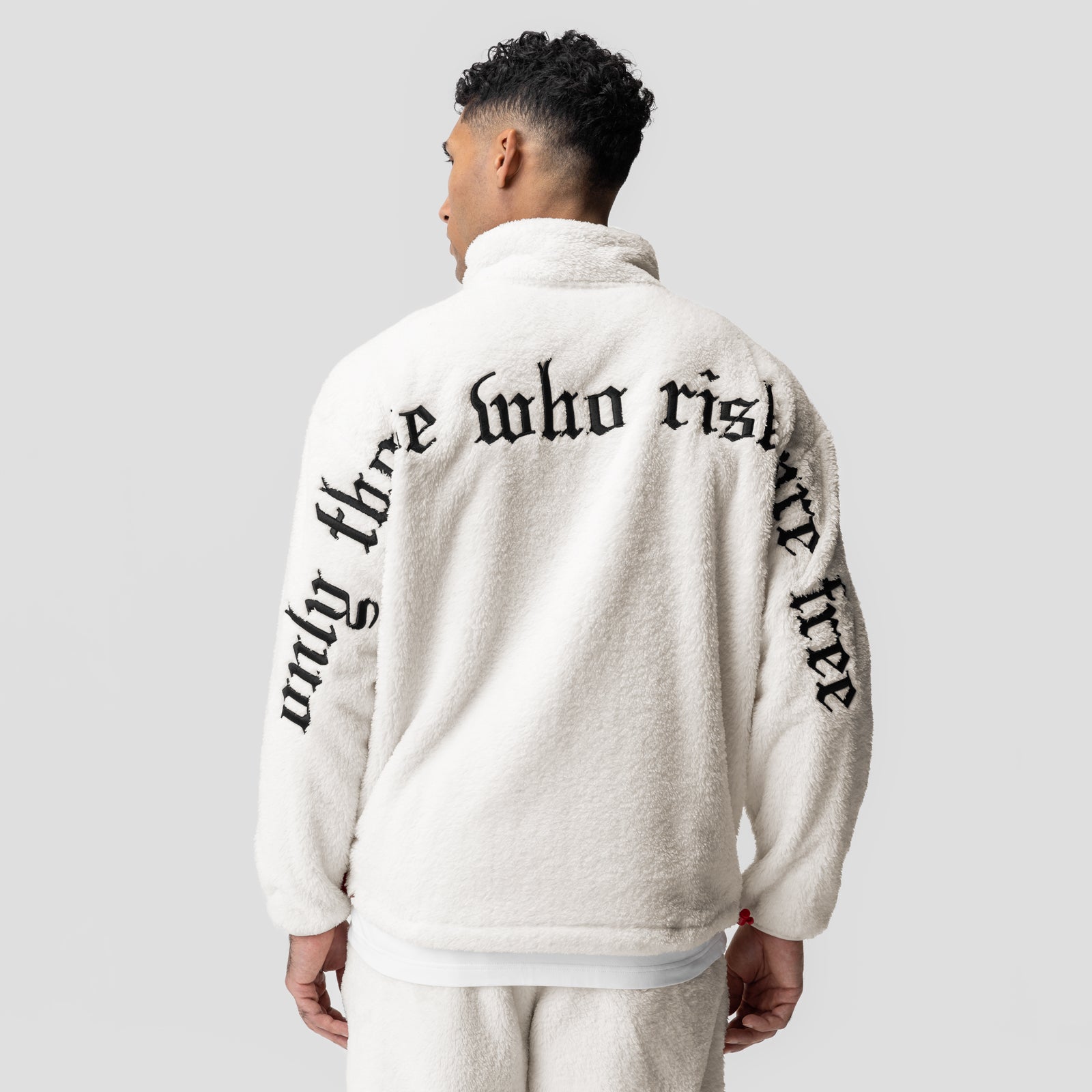 Sherpa Recovery 1/2 Zip in ivory cream with black text, back view on model