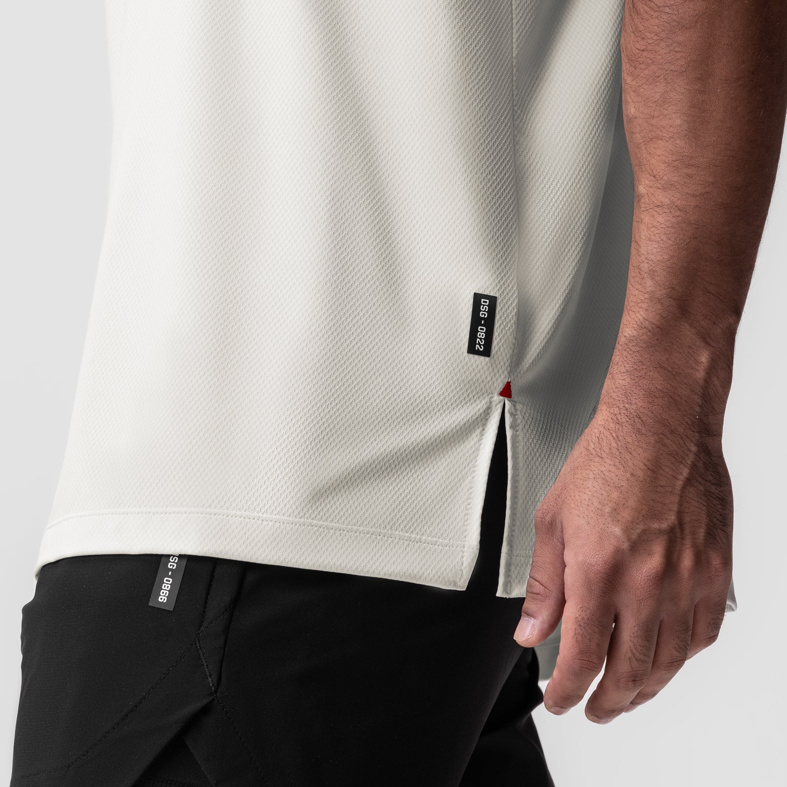 AeroSilver Oversized Tee in Ivory Cream worn by model, side detail view