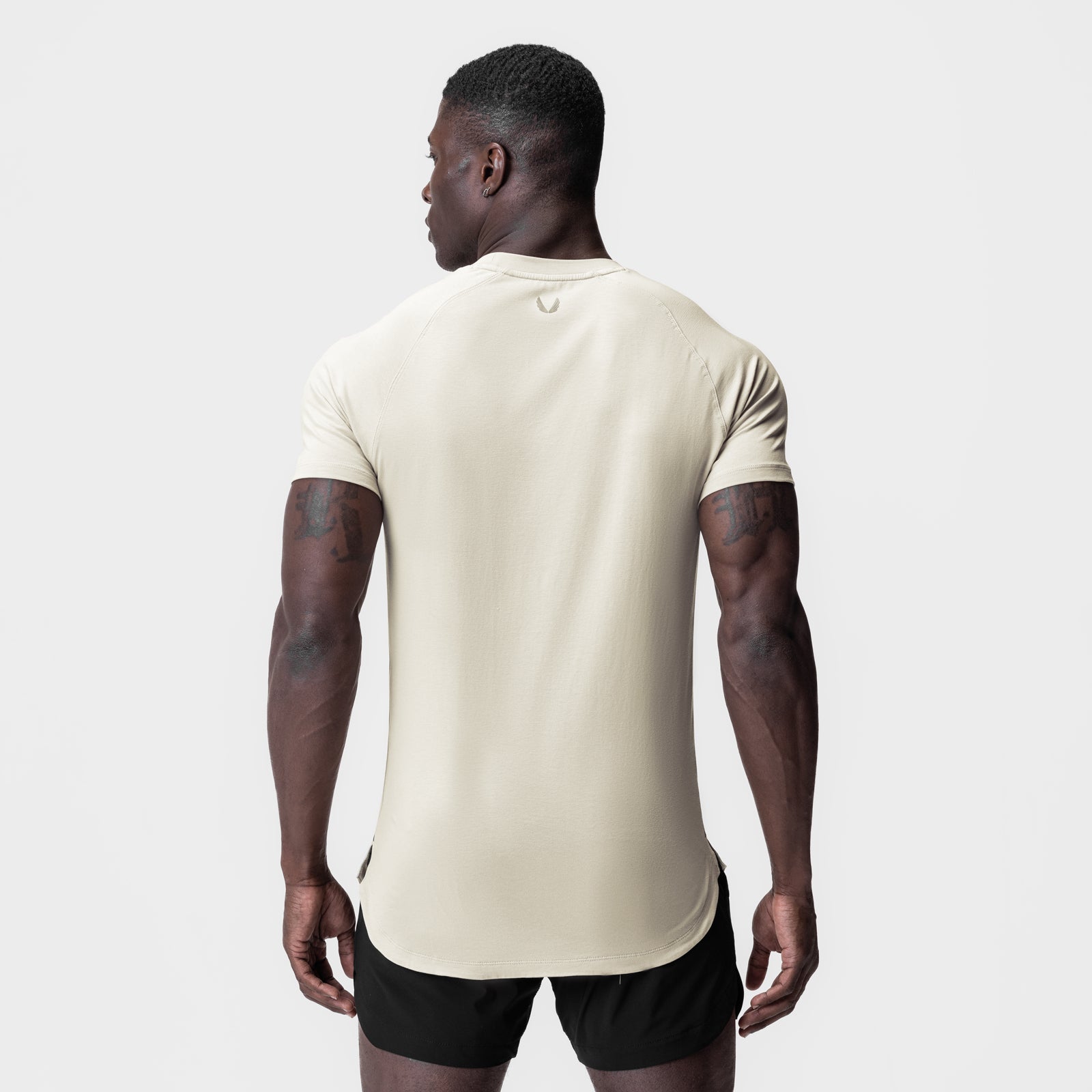 Supima Established Tee in ivory cream worn by model, back view