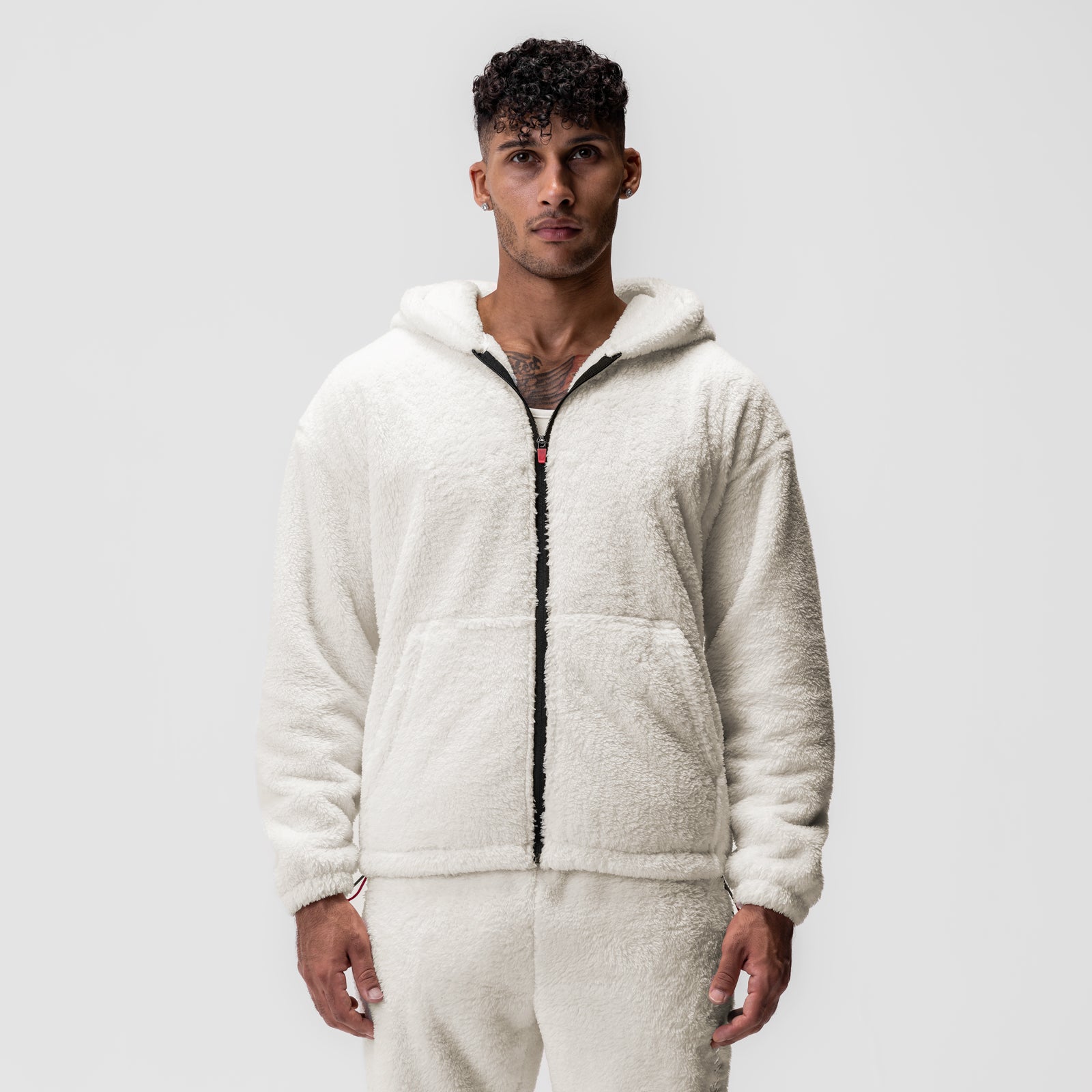 Sherpa Recovery Full Zip Hoodie in ivory cream, worn by model, front view