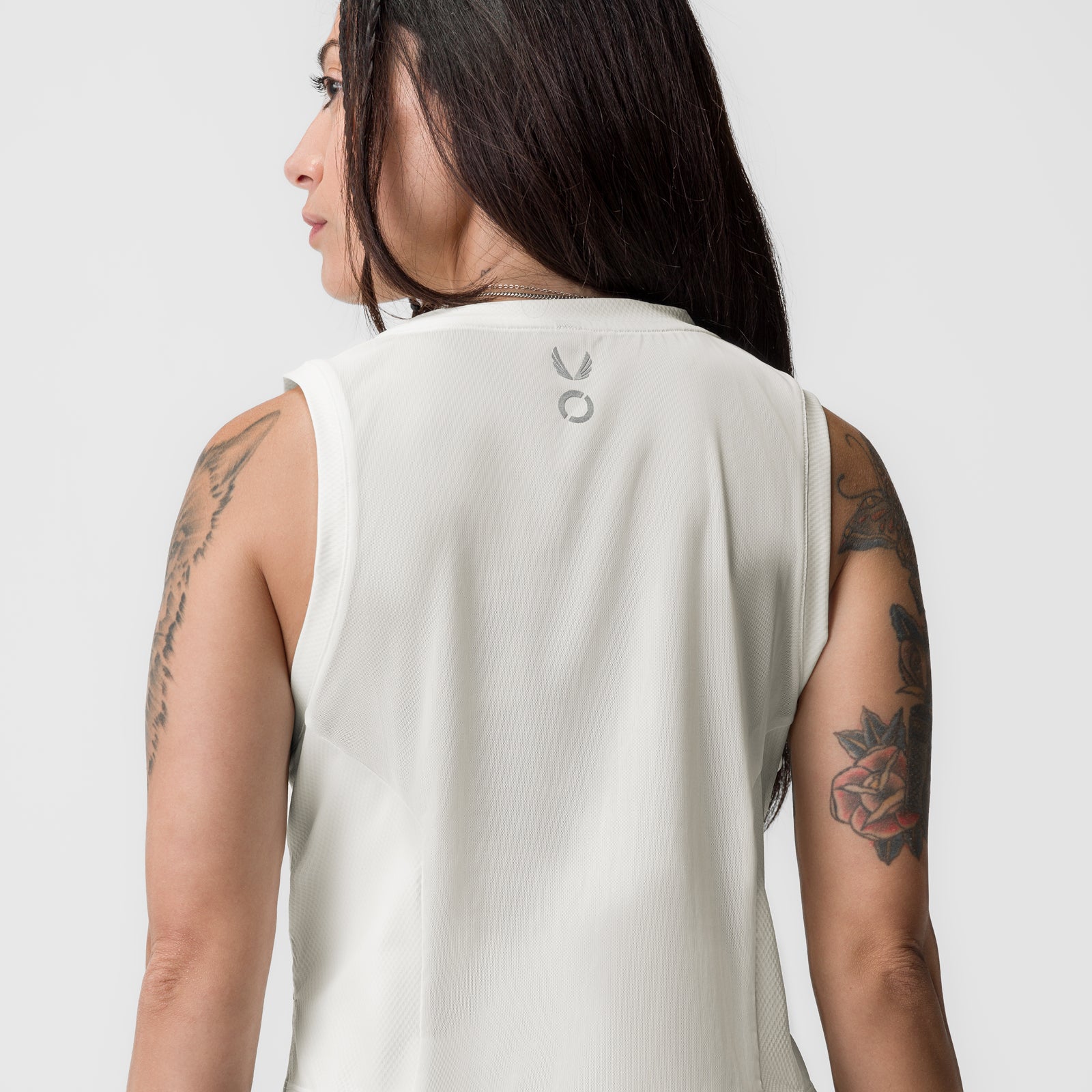 AeroSilver Cropped Training Tank in ivory cream, back view on model