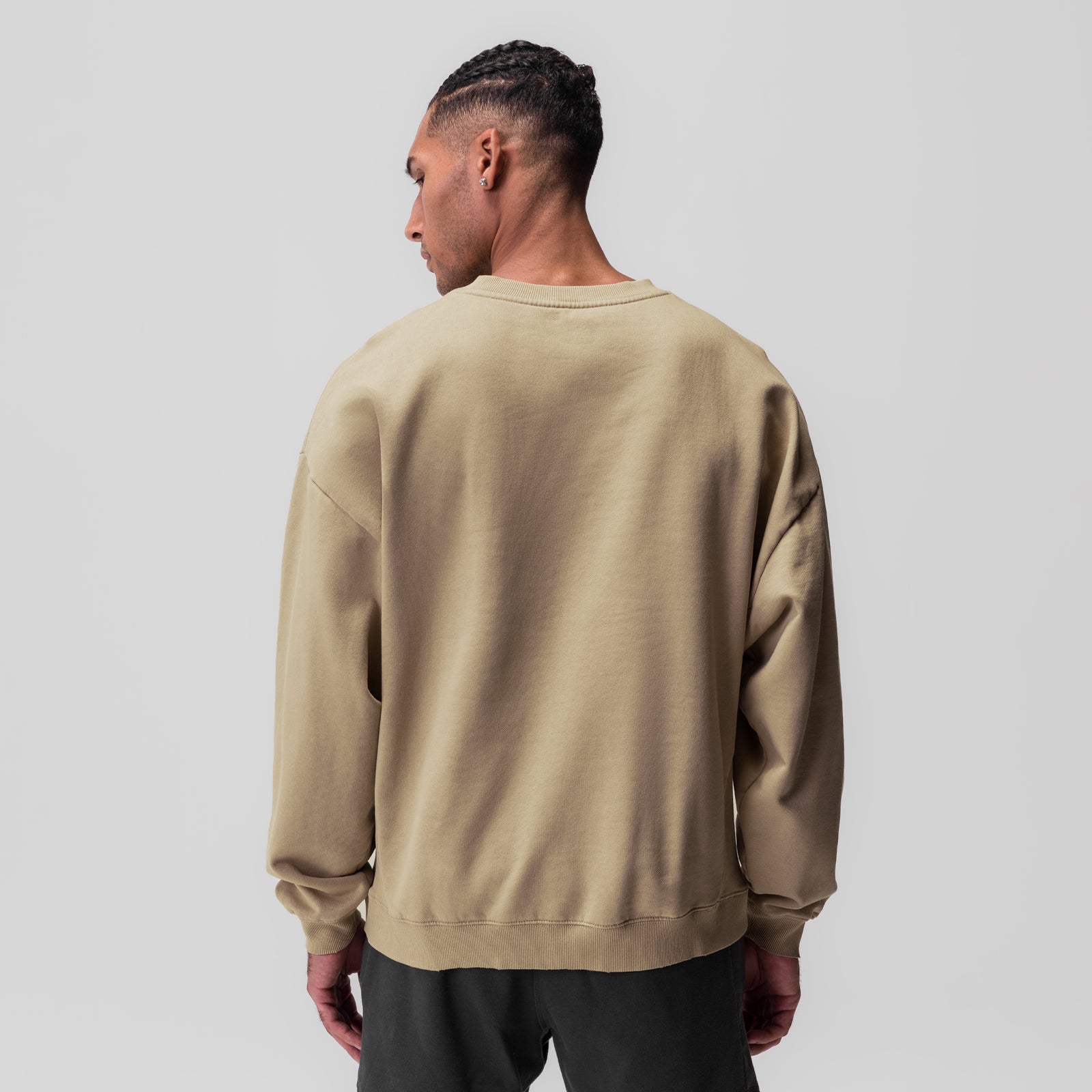 Tech Essential Distressed Crewneck in khaki, worn by model shown from back