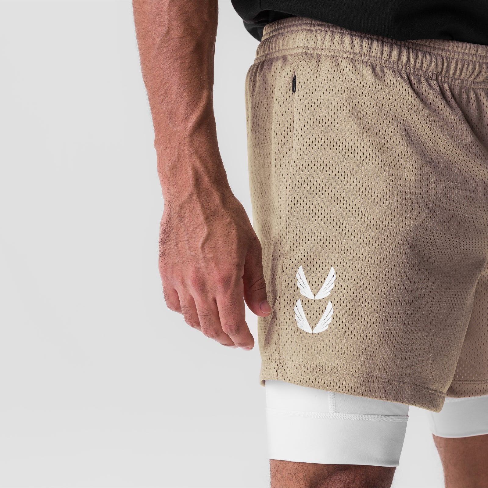 SilverPlus™ Mesh 5" Liner Short in khaki with white liner, worn by model, side view