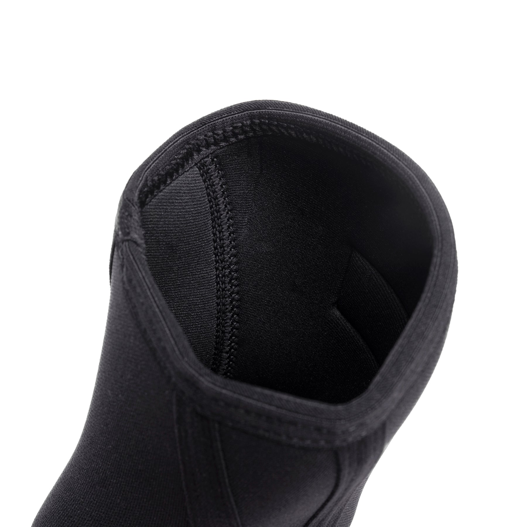 Black knee sleeve detail closeup showing interior fabric construction