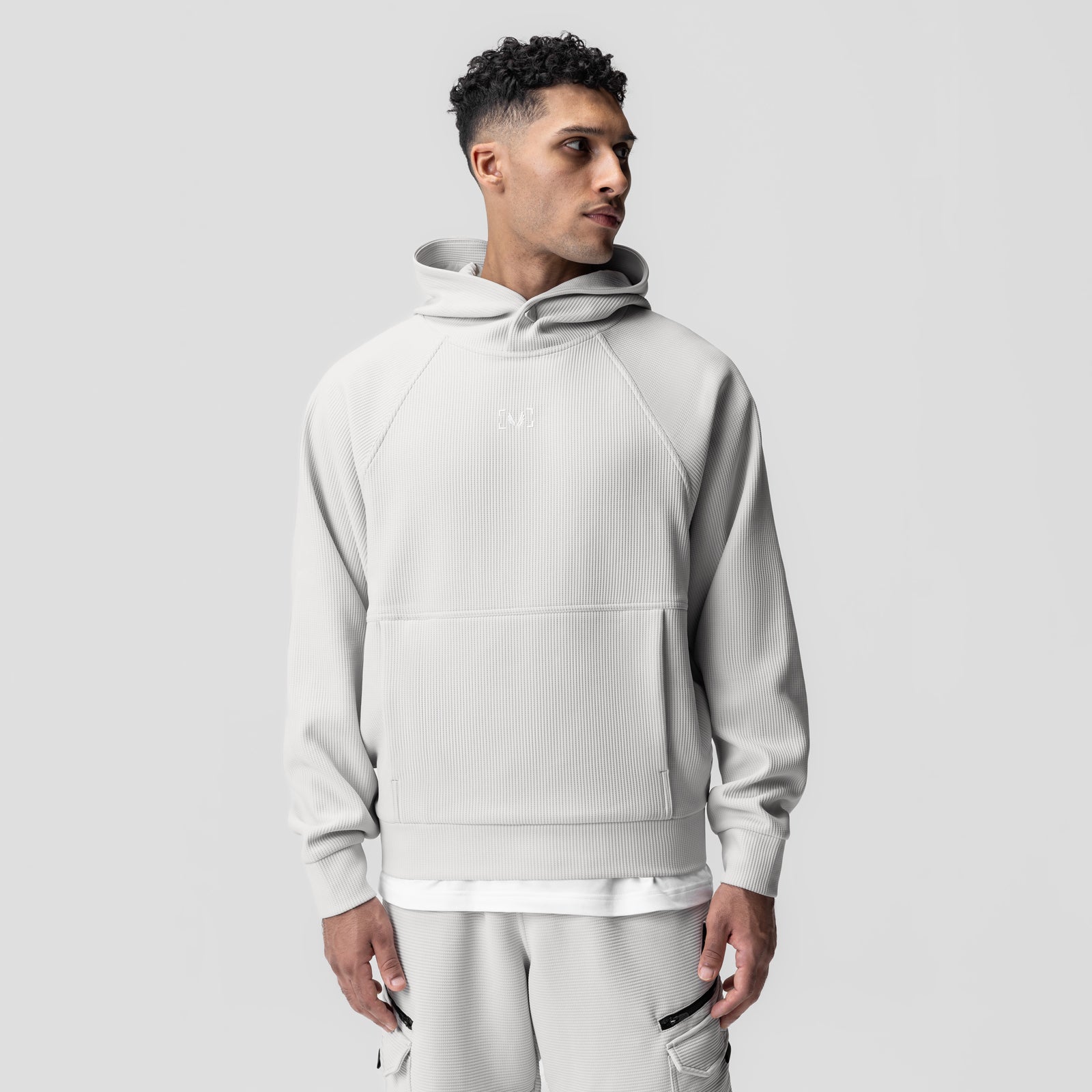 Deltapeak® Oversized Hoodie in light grey, worn by model in three-quarter view