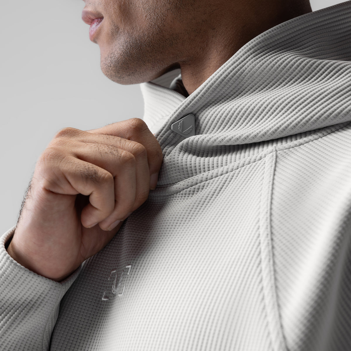 Deltapeak® Oversized Hoodie in light grey, worn by model showing shoulder and hood detail