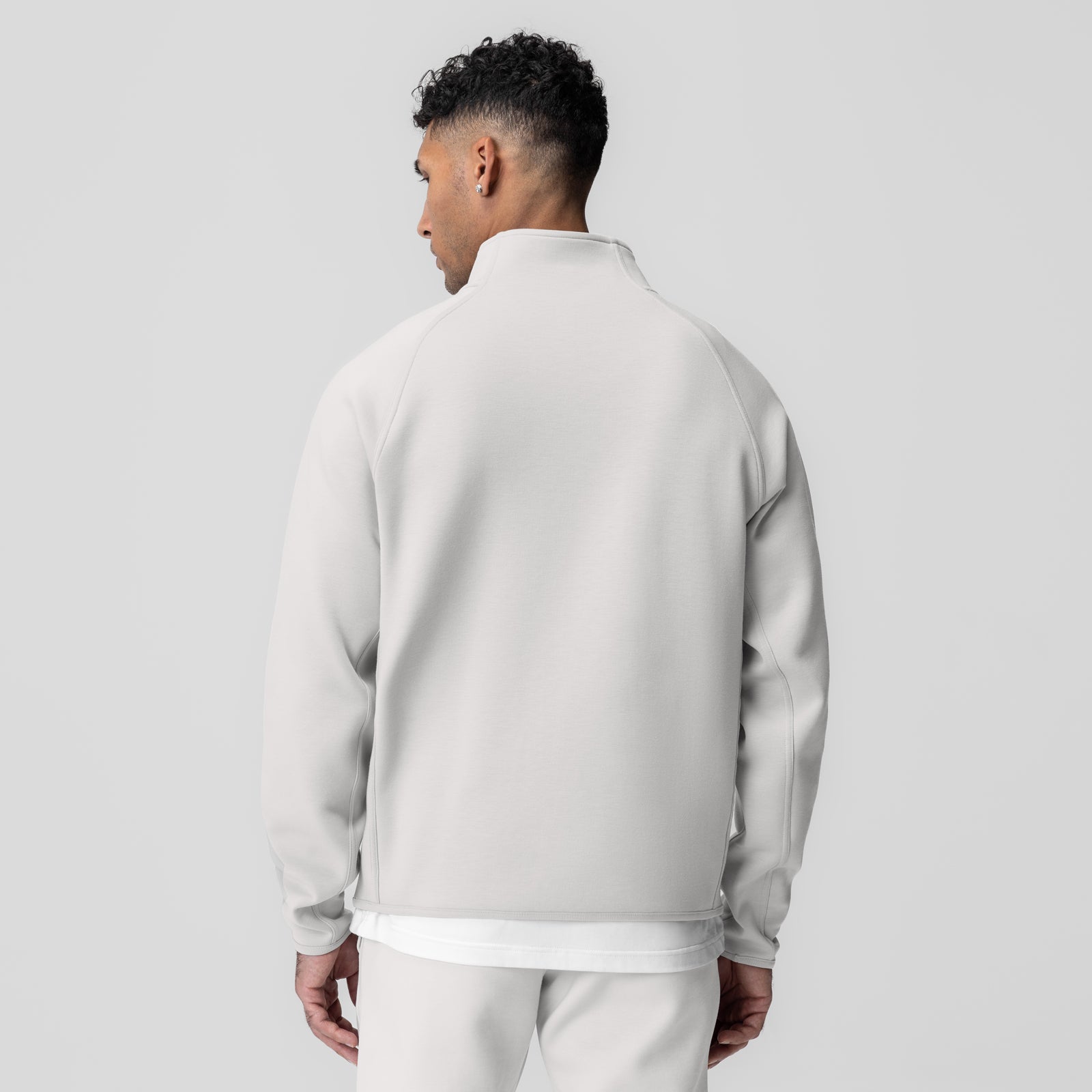 Dri-Core Quarter Zip in light grey, worn by model, back view