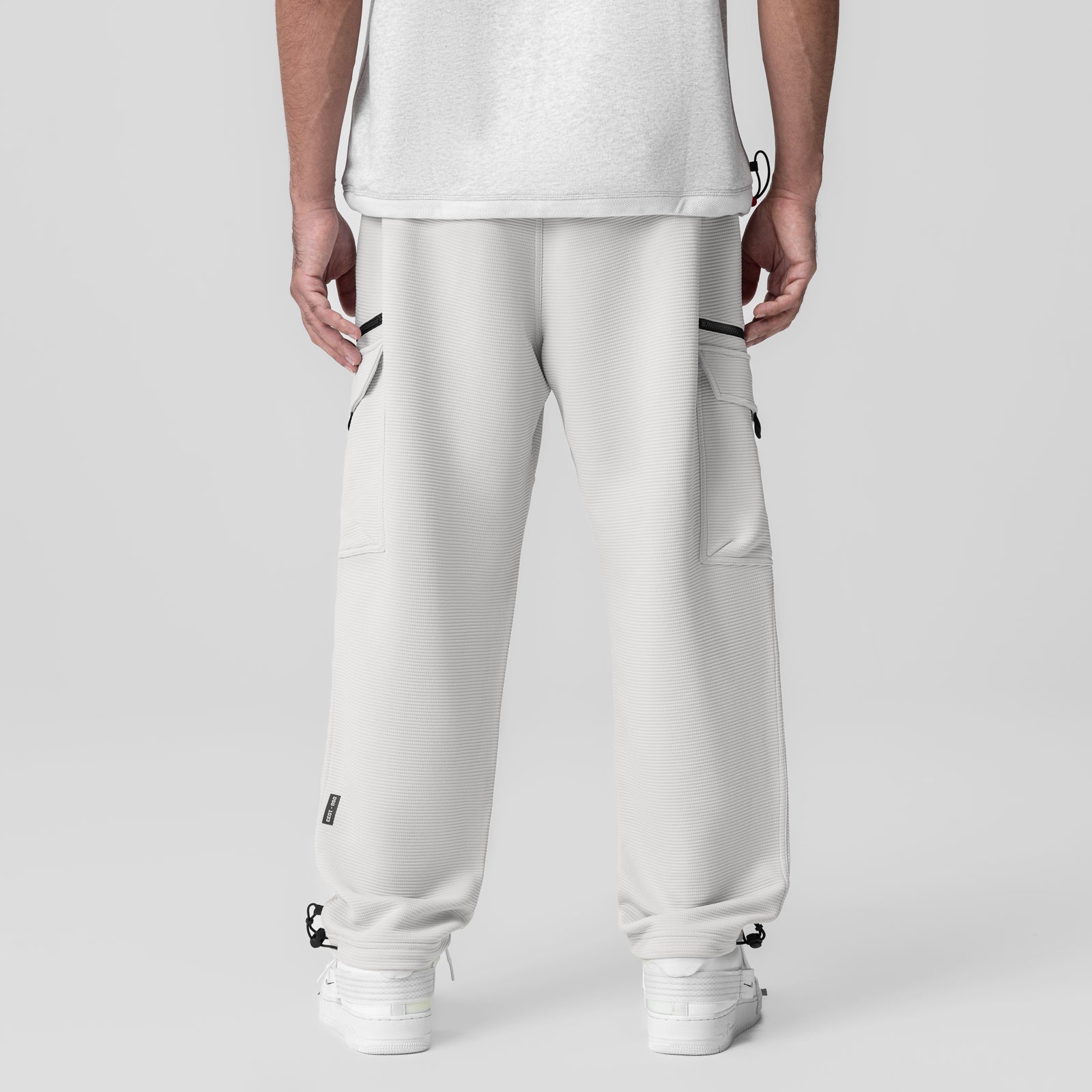 Deltapeak® Cargo Cinch Jogger in light grey, rear view on model