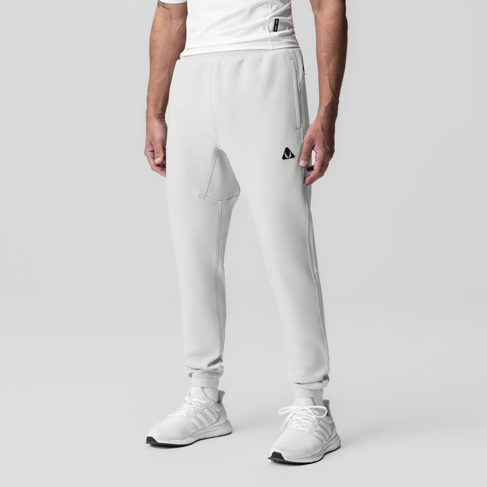 Dri-Core Training Jogger in light grey worn by model, front-facing view