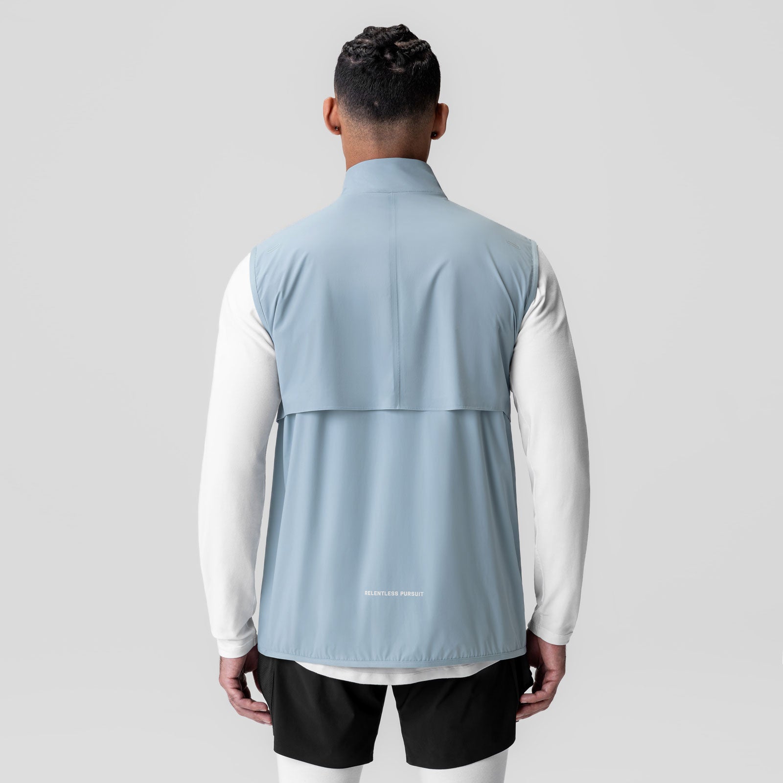 Aerotex PrimaLoft Run Vest in light sky, back view on model