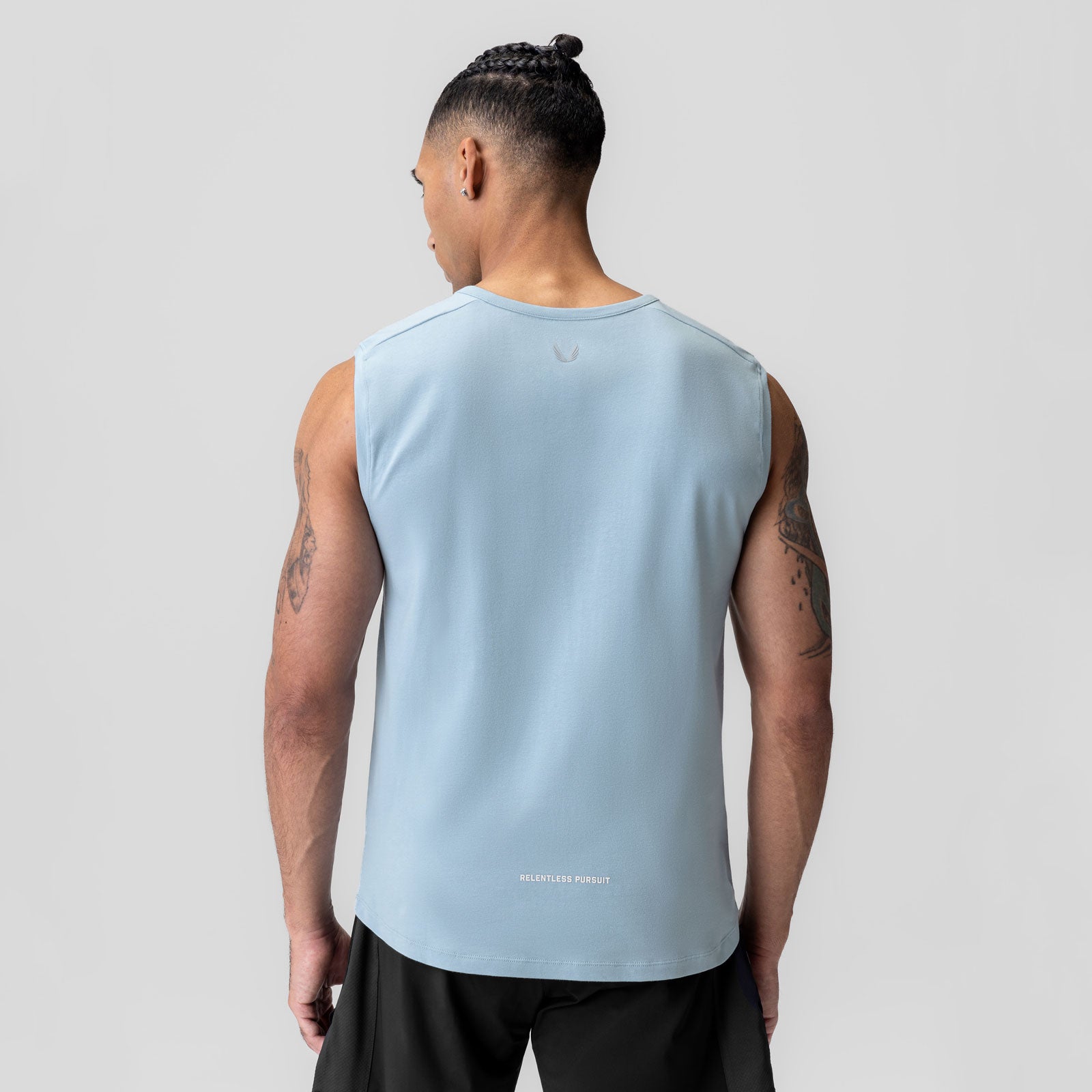 Light Sky Creora® Cotton Modal Cutoff Tank worn by model, back view