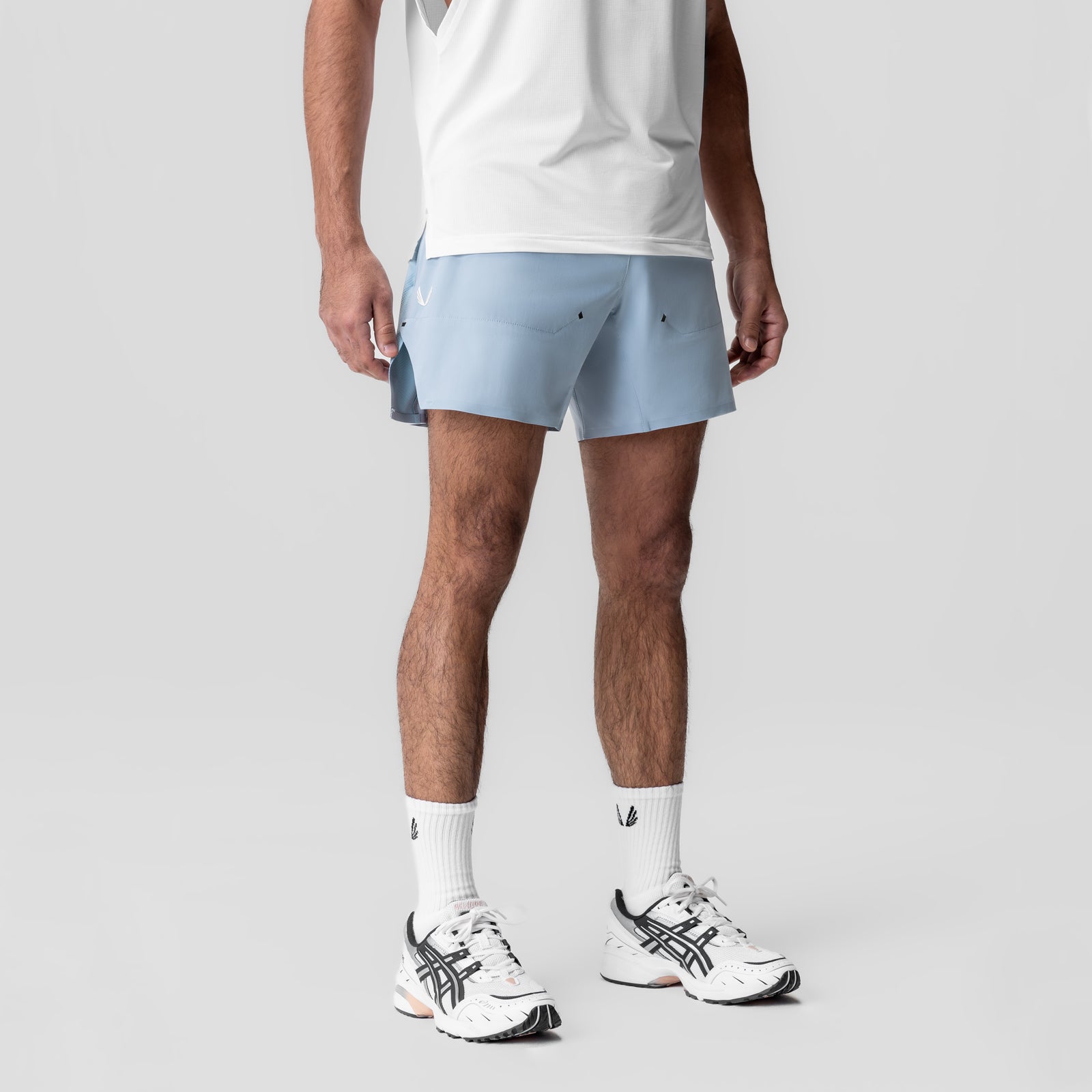 Tetra-Lite Bonded Training Short in light sky, back view on model