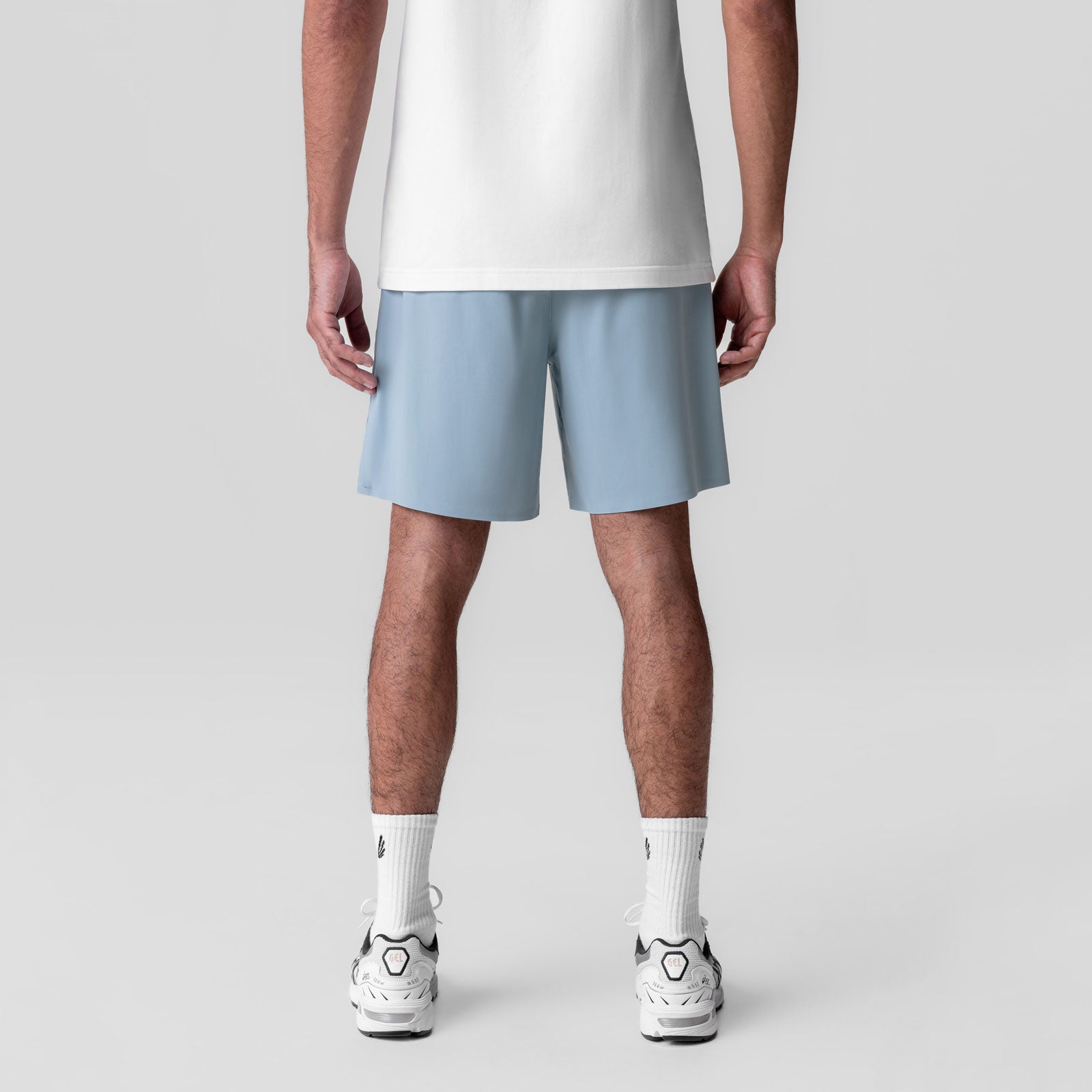 Revolutional Field Short in light sky blue, back view on model wearing white tee and white sneakers