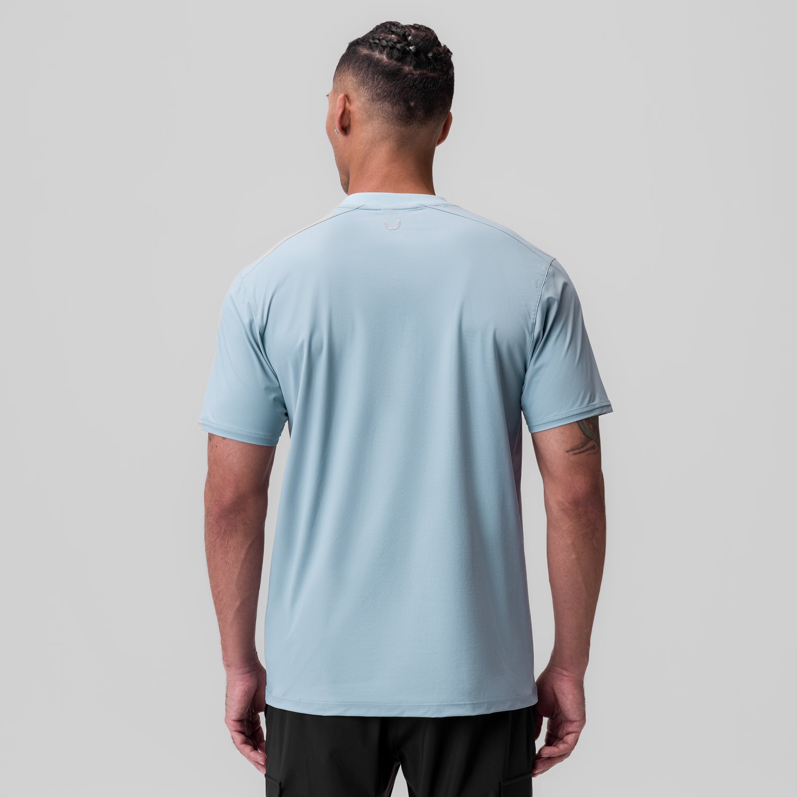 Tetra-Lite Ice Zip Tee in light sky blue, back view on model