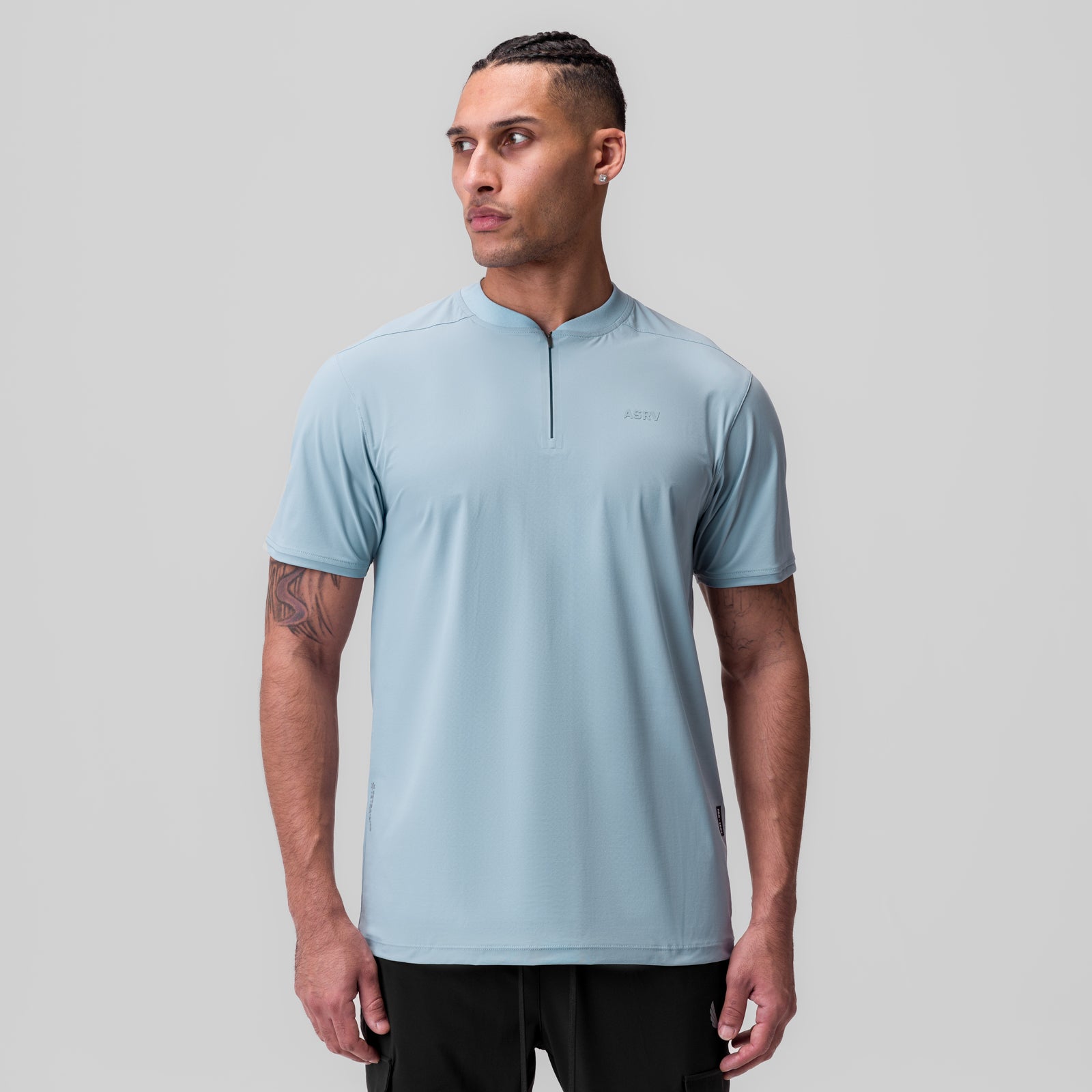 Tetra-Lite Ice Zip Tee in light sky blue, worn by model, front view
