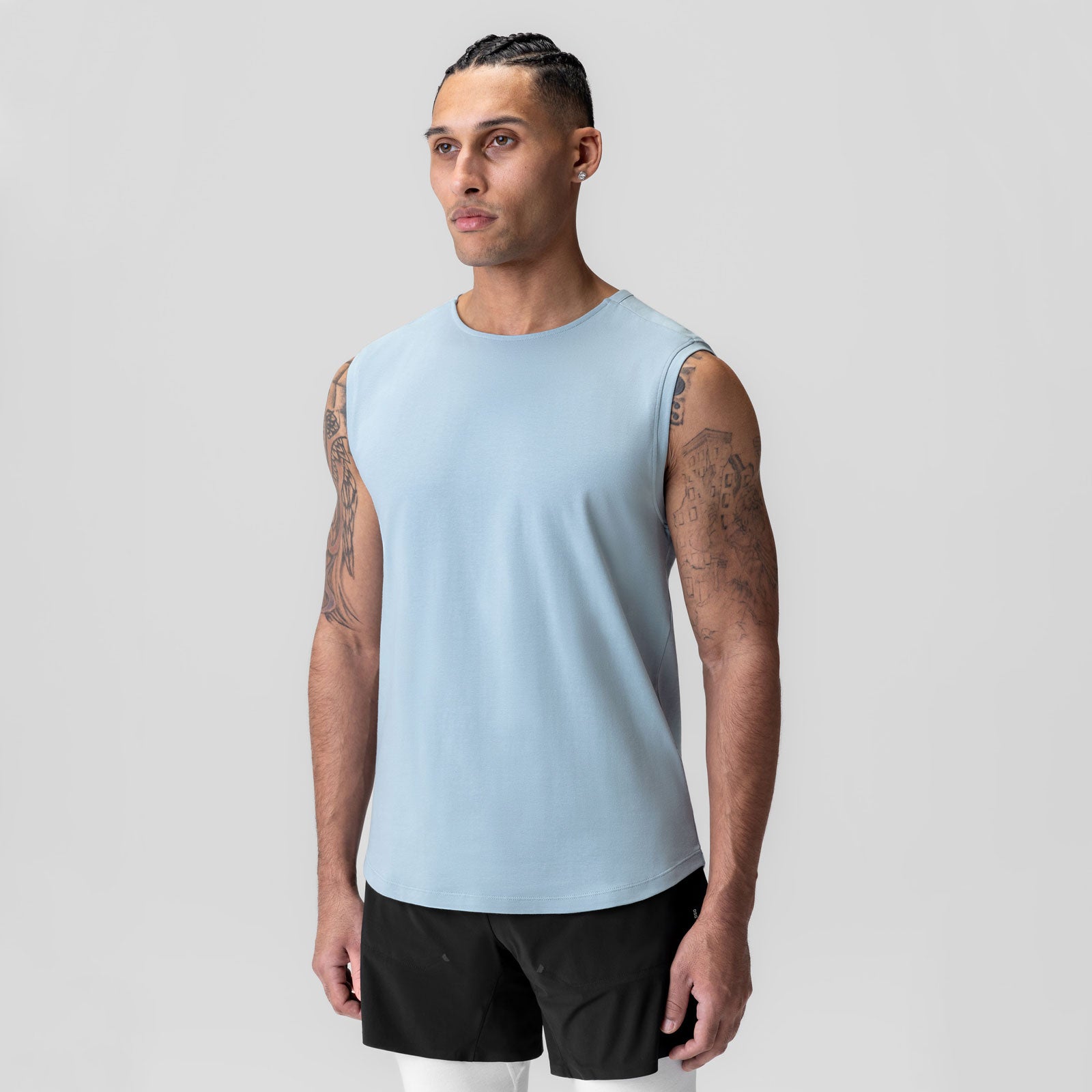 Light Sky Creora® Cotton Modal Cutoff Tank worn by male model, front view