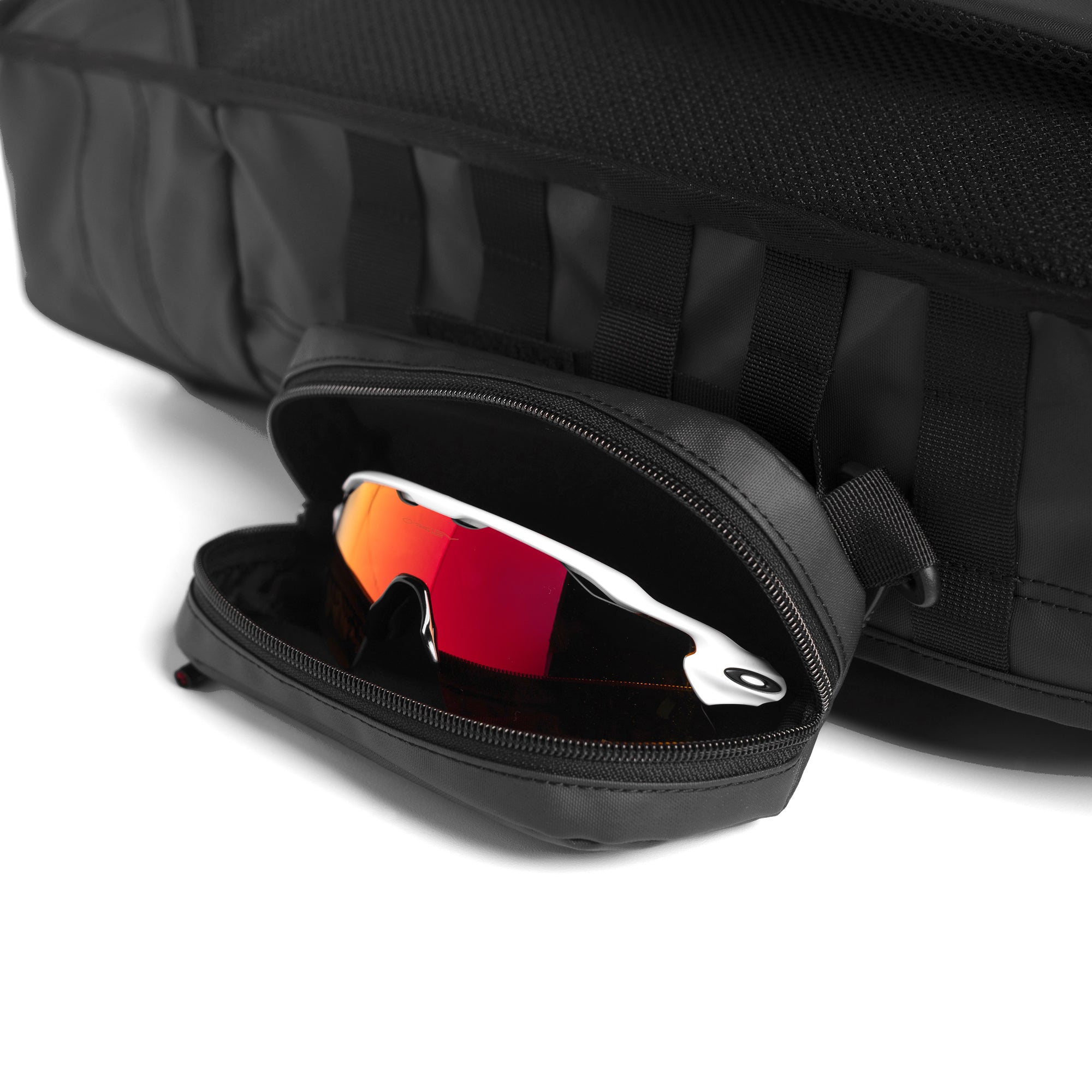 Flatlay 0275 Water Resistant Modular Backpack 16L in Black with sunglasses detail