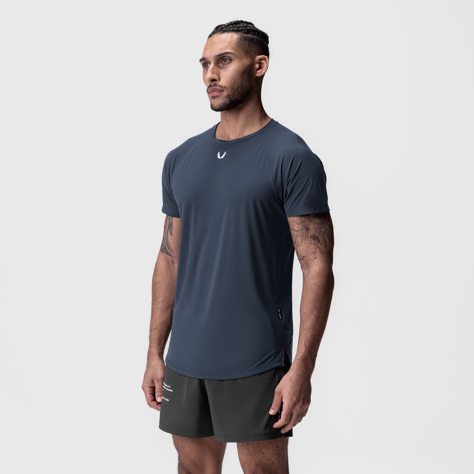 Laser-Vent™ Established Tee in navy worn by male model, side view
