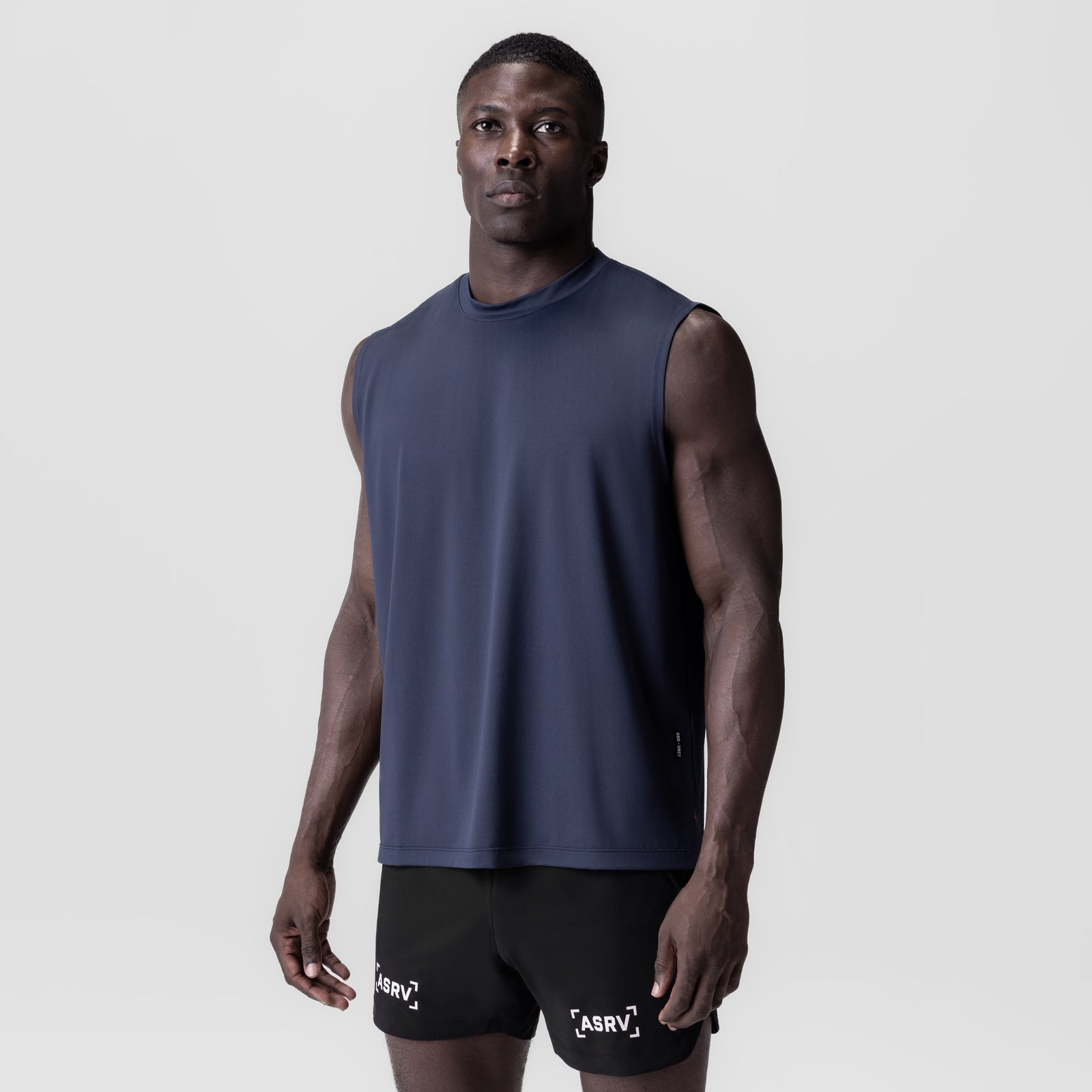 Navy 3D-Lite® 2.0 Lycra® Relaxed Cutoff sleeveless tank on model, front view