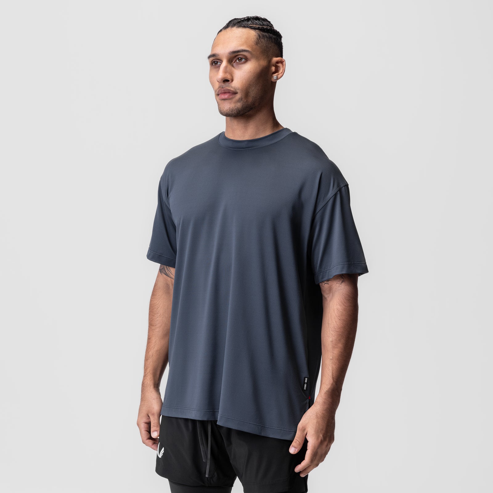 AeroSilver Oversized Tee in navy worn by model, front view