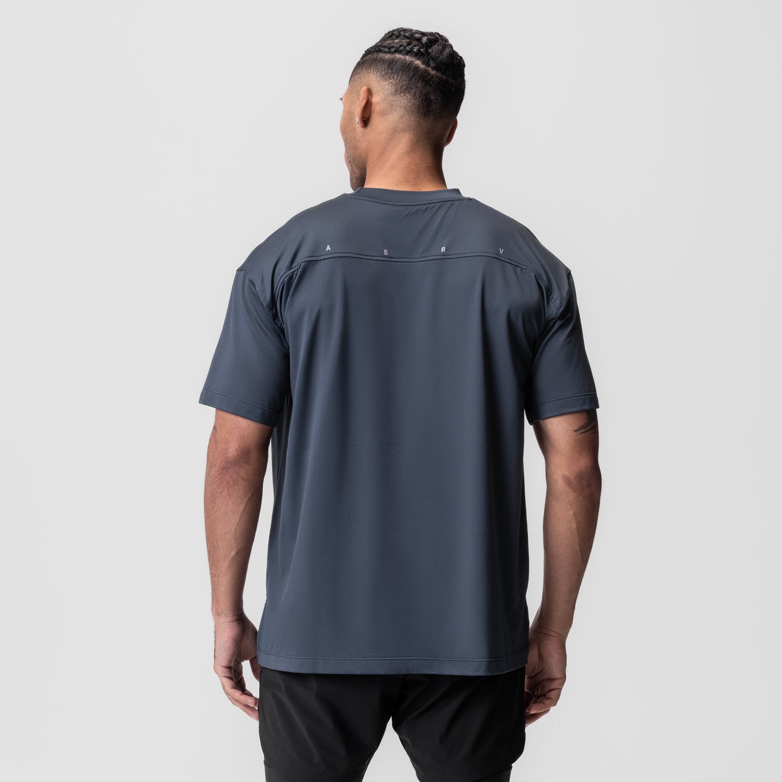 AeroSilver Oversized Tee in navy worn by model, back view