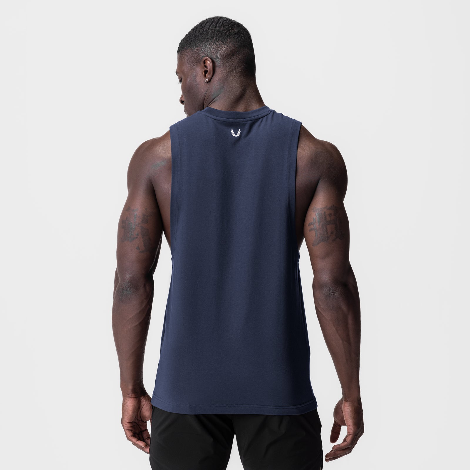 Navy Supima® Muscle Tank worn by model, back view