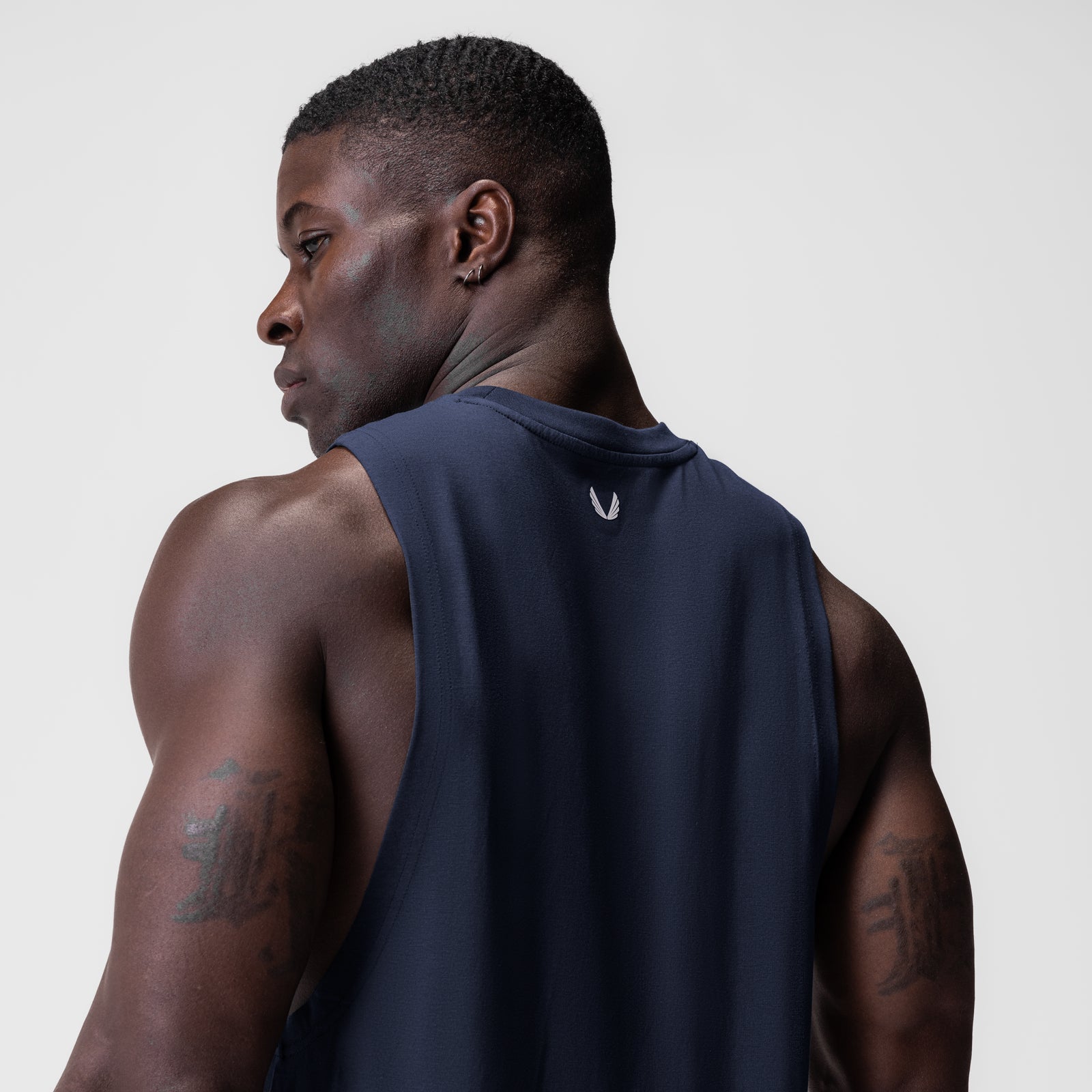 Supima® Muscle Tank in navy, worn by model shown from back, showcasing fit and design
